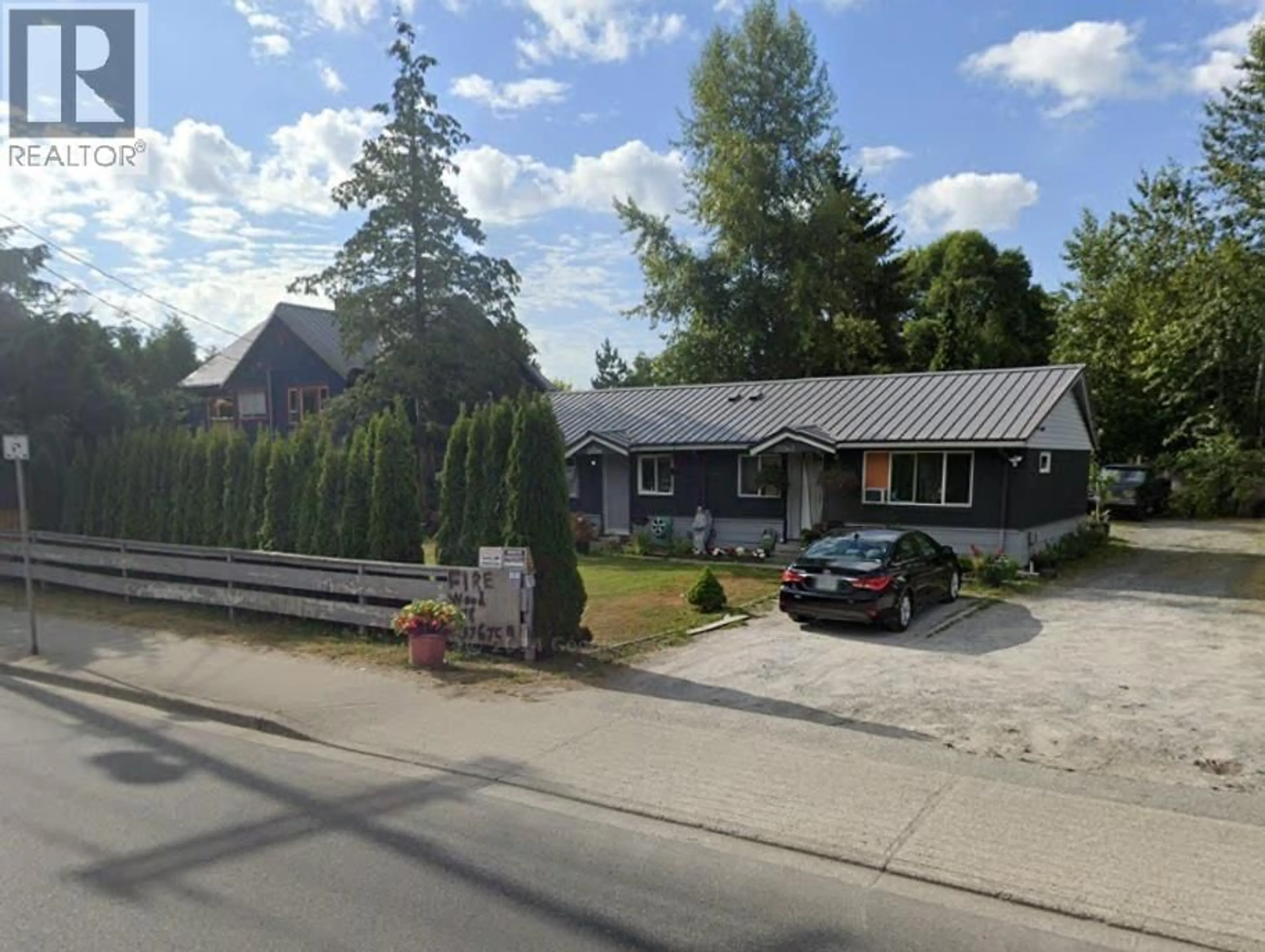 A pic from outside/outdoor area/front of a property/back of a property/a pic from drone, street for 23266 DEWDNEY TRUNK ROAD, Maple Ridge British Columbia V2X3L4
