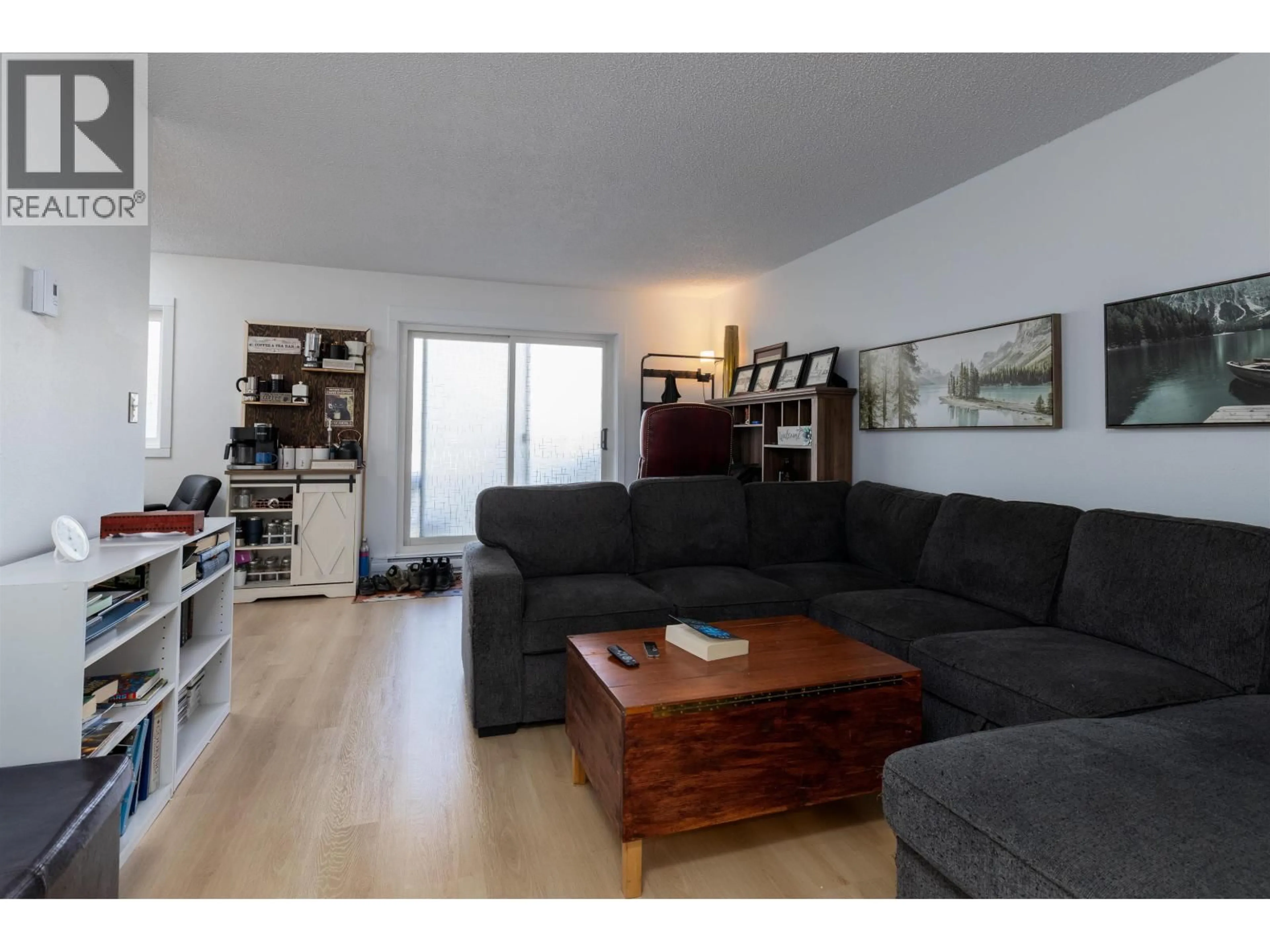 Living room with furniture, wood/laminate floor for 1101 - 2607 PEAR STREET, Terrace British Columbia V8G4V5