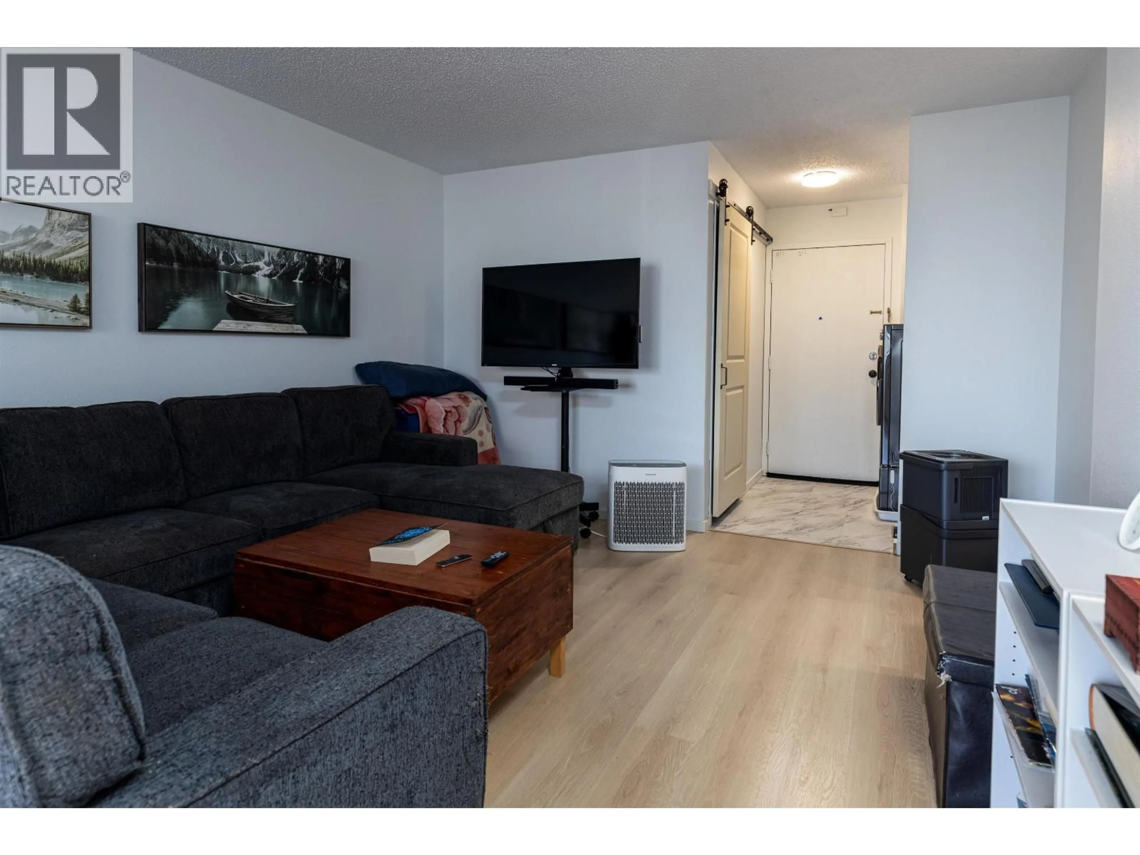 Living room with furniture, wood/laminate floor for 1101 - 2607 PEAR STREET, Terrace British Columbia V8G4V5