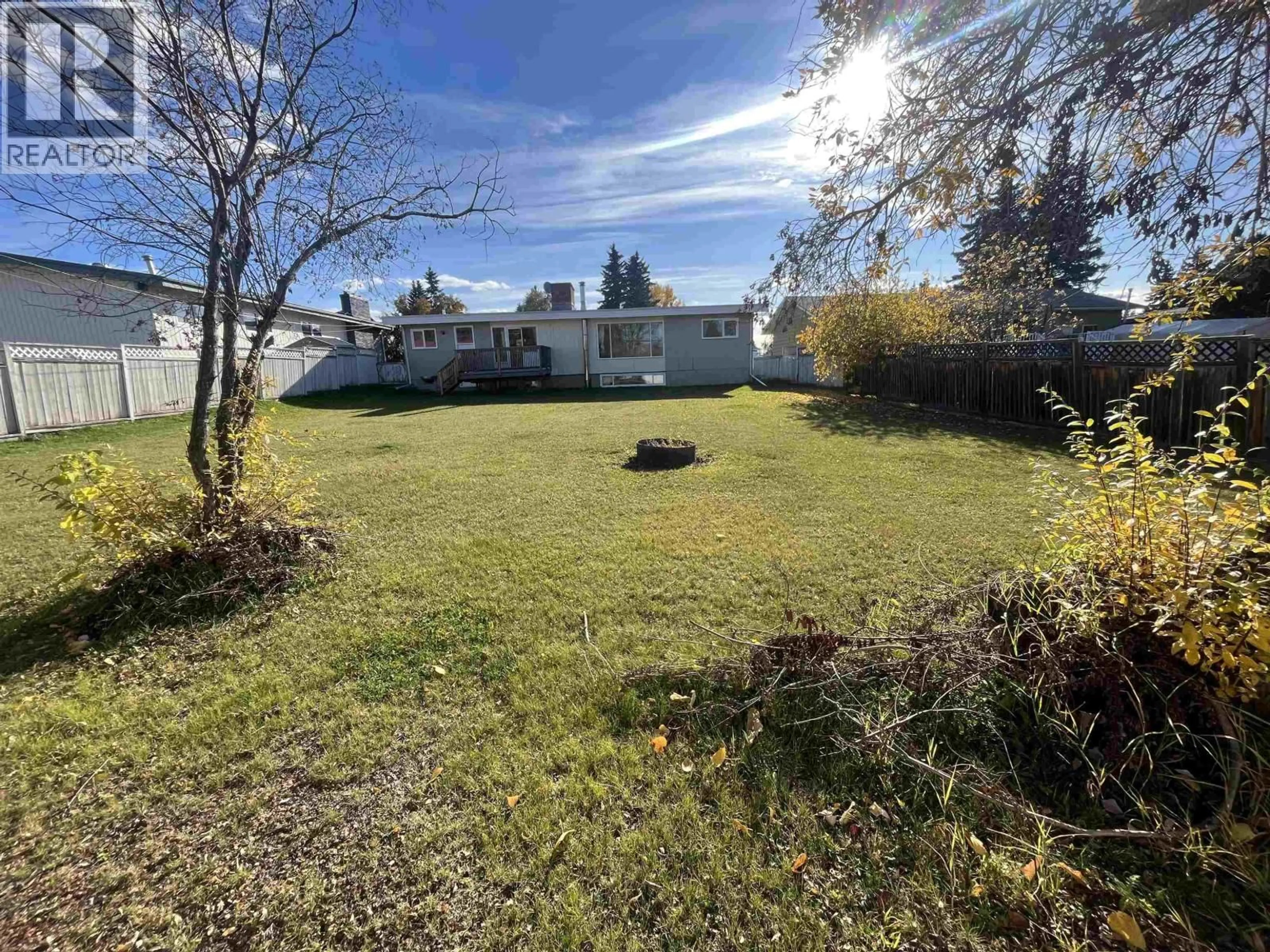 A pic from outside/outdoor area/front of a property/back of a property/a pic from drone, unknown for 9312 112 AVENUE, Fort St. John British Columbia V1J2V9