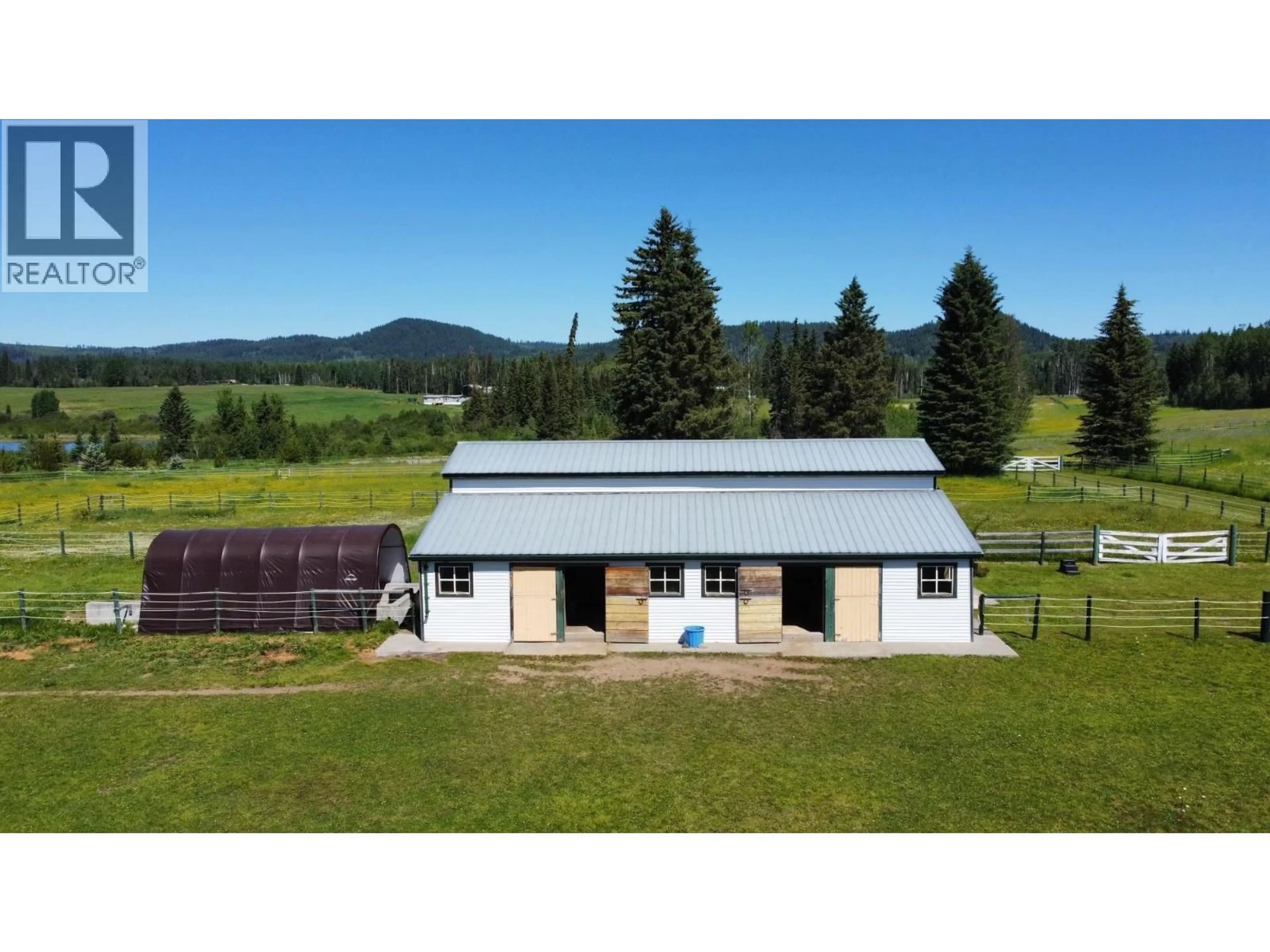 A pic from outside/outdoor area/front of a property/back of a property/a pic from drone, mountain view for 8320 RAINBOW COUNTRY ROAD, Bridge Lake British Columbia V0K1X2