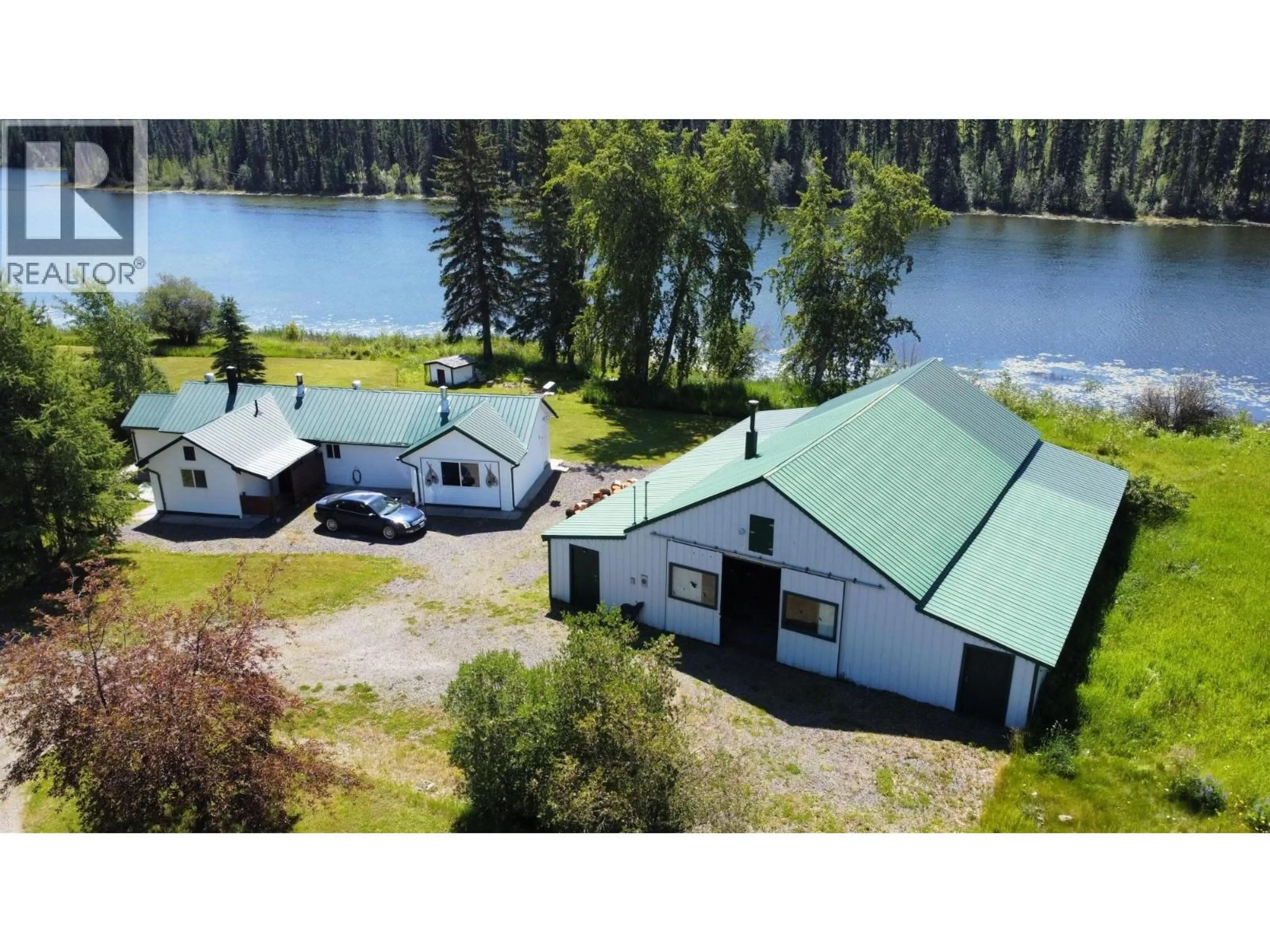 A pic from outside/outdoor area/front of a property/back of a property/a pic from drone, water/lake/river/ocean view for 8320 RAINBOW COUNTRY ROAD, Bridge Lake British Columbia V0K1X2