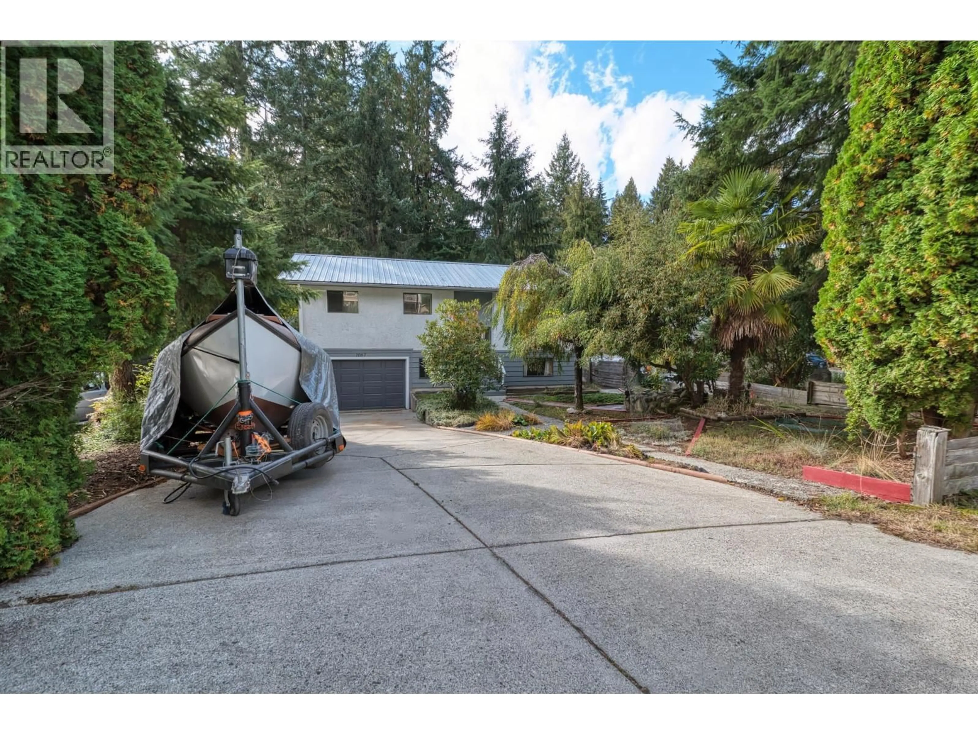 A pic from outside/outdoor area/front of a property/back of a property/a pic from drone, street for 1067 FIRCREST ROAD, Gibsons British Columbia V0N1V4