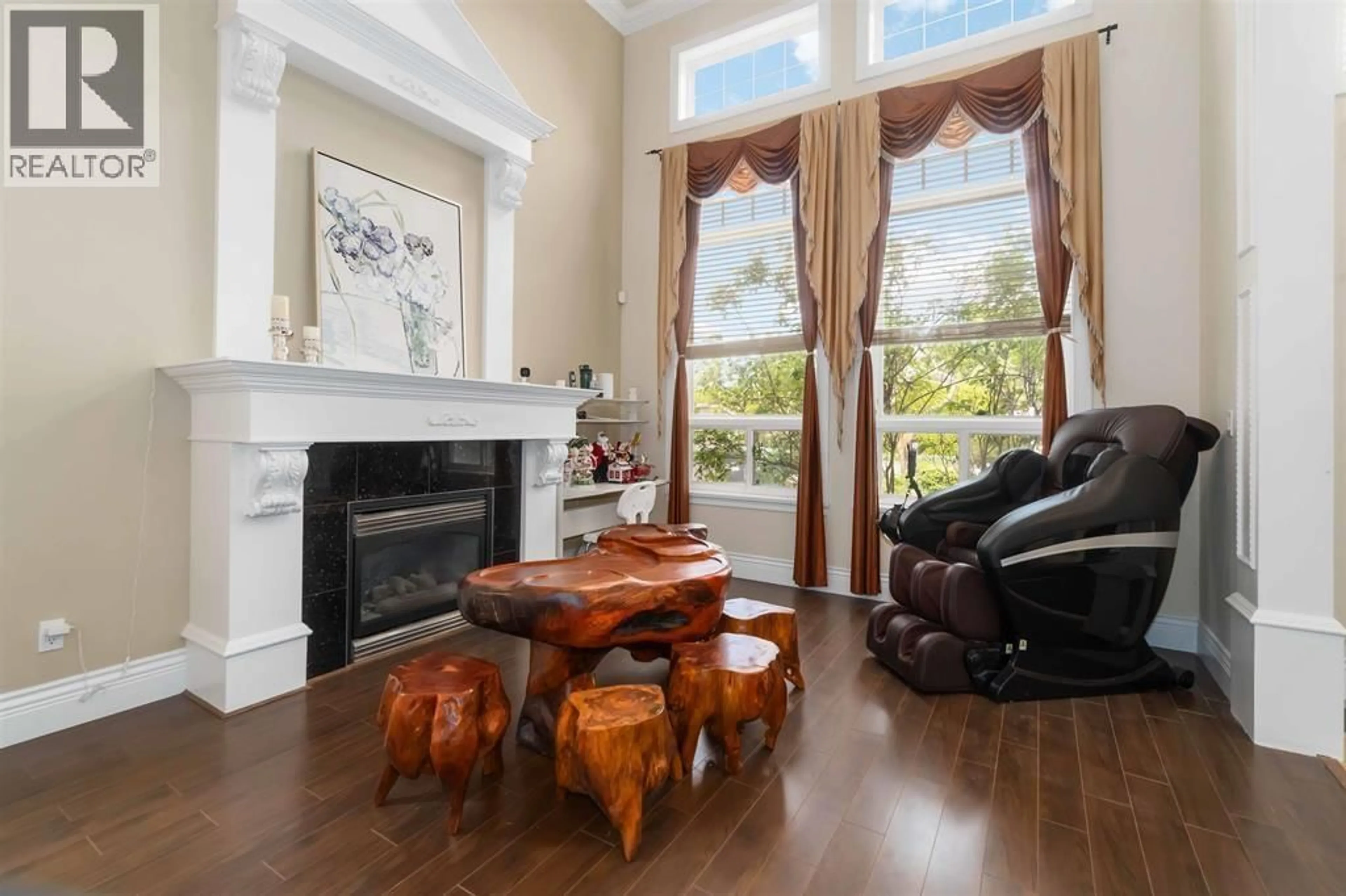 Living room with furniture, wood/laminate floor for 6040 ADAMS PLACE, Richmond British Columbia V7C2N1