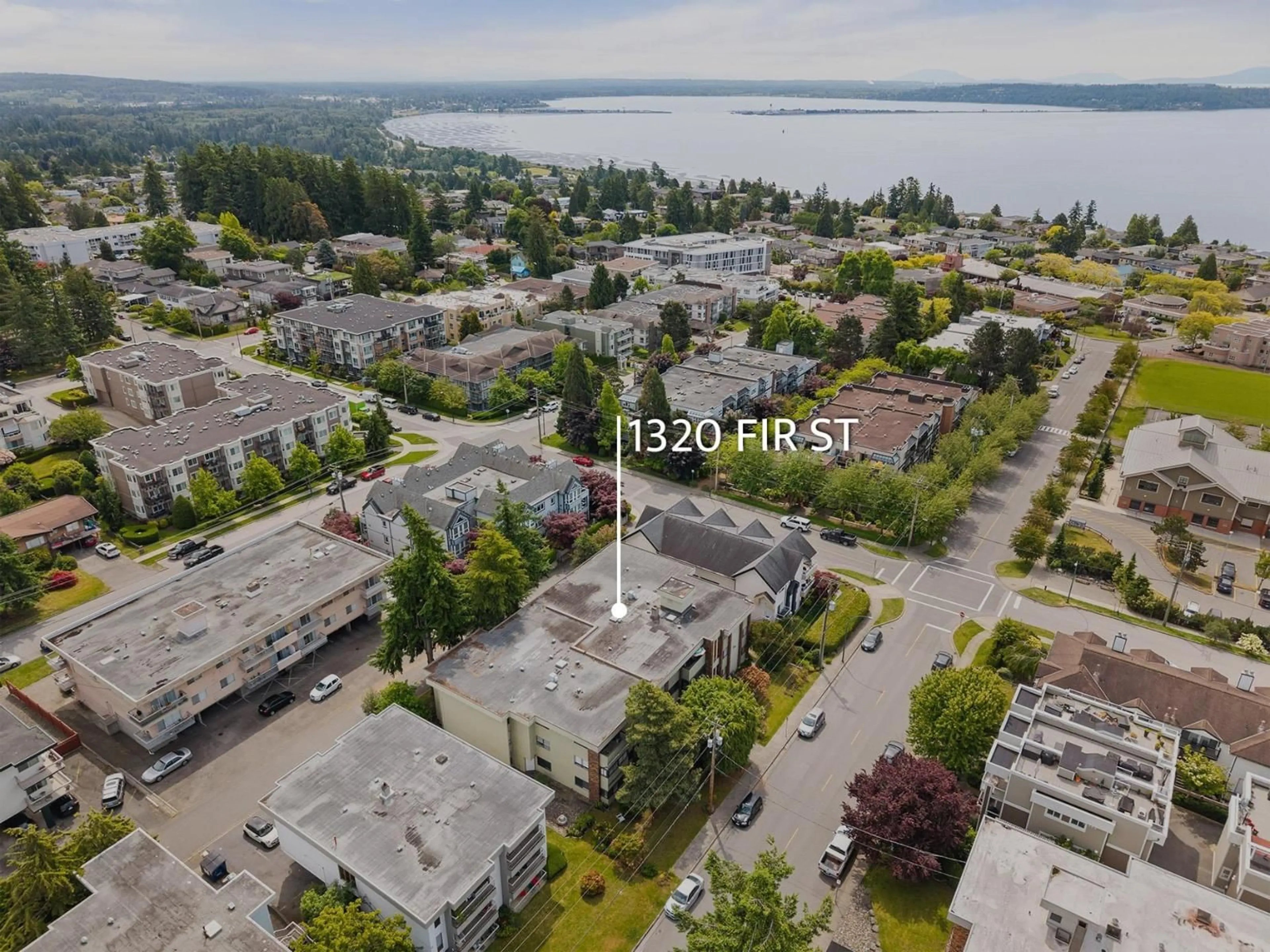 A pic from outside/outdoor area/front of a property/back of a property/a pic from drone, water/lake/river/ocean view for 104 - 1320 FIR, White Rock British Columbia V4B4B2