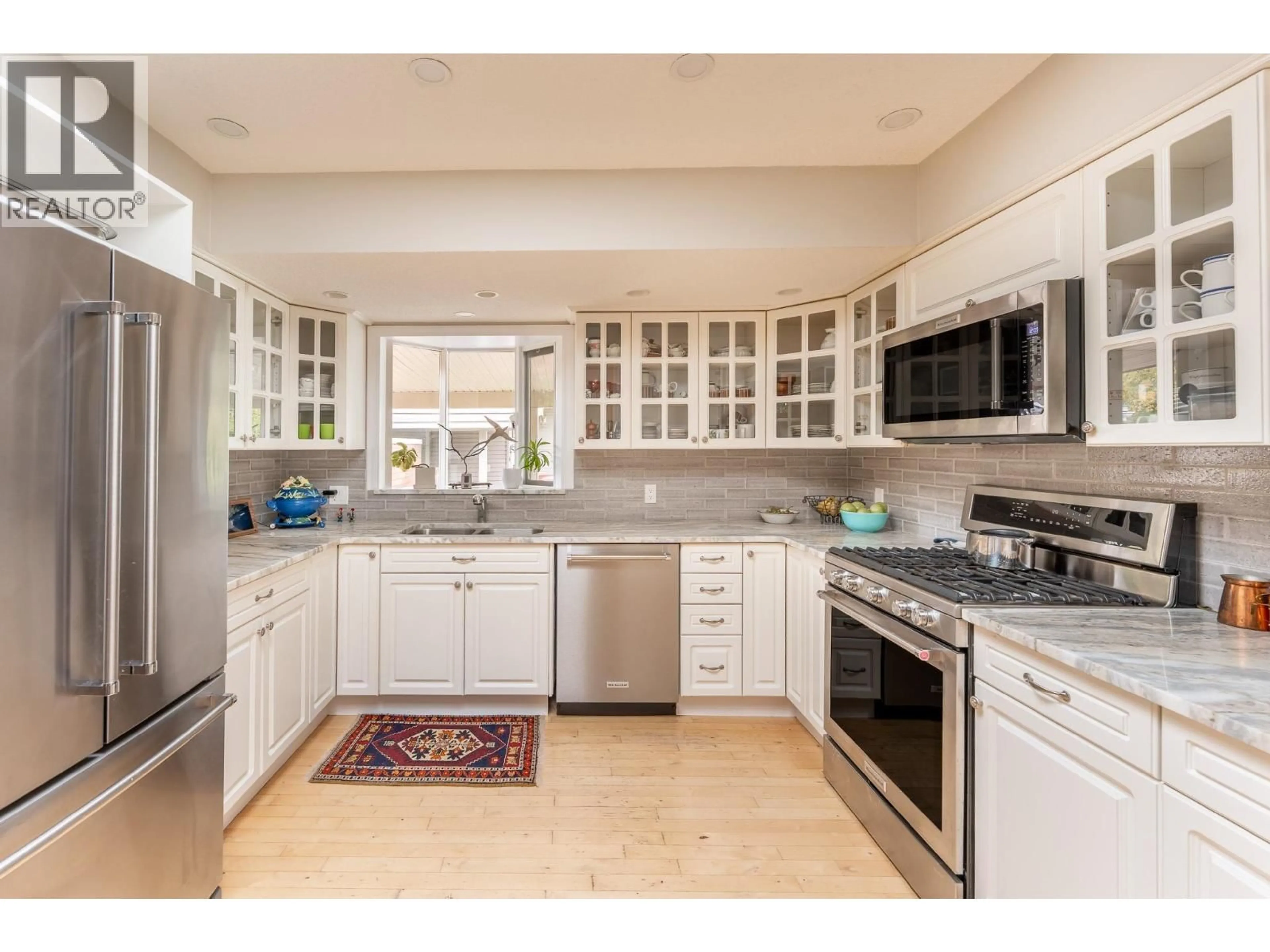 Open concept kitchen, ceramic/tile floor for 2700 HAMMOND AVENUE, Prince George British Columbia V2M1A5