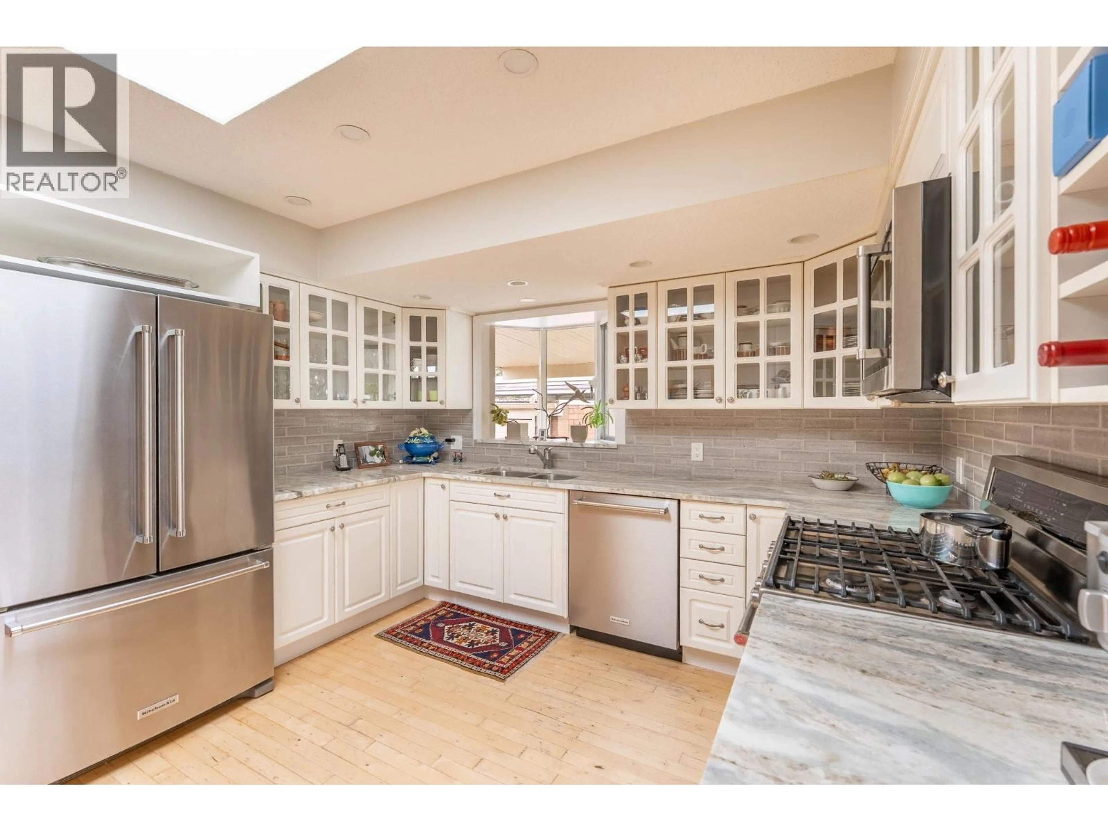 Open concept kitchen, ceramic/tile floor for 2700 HAMMOND AVENUE, Prince George British Columbia V2M1A5