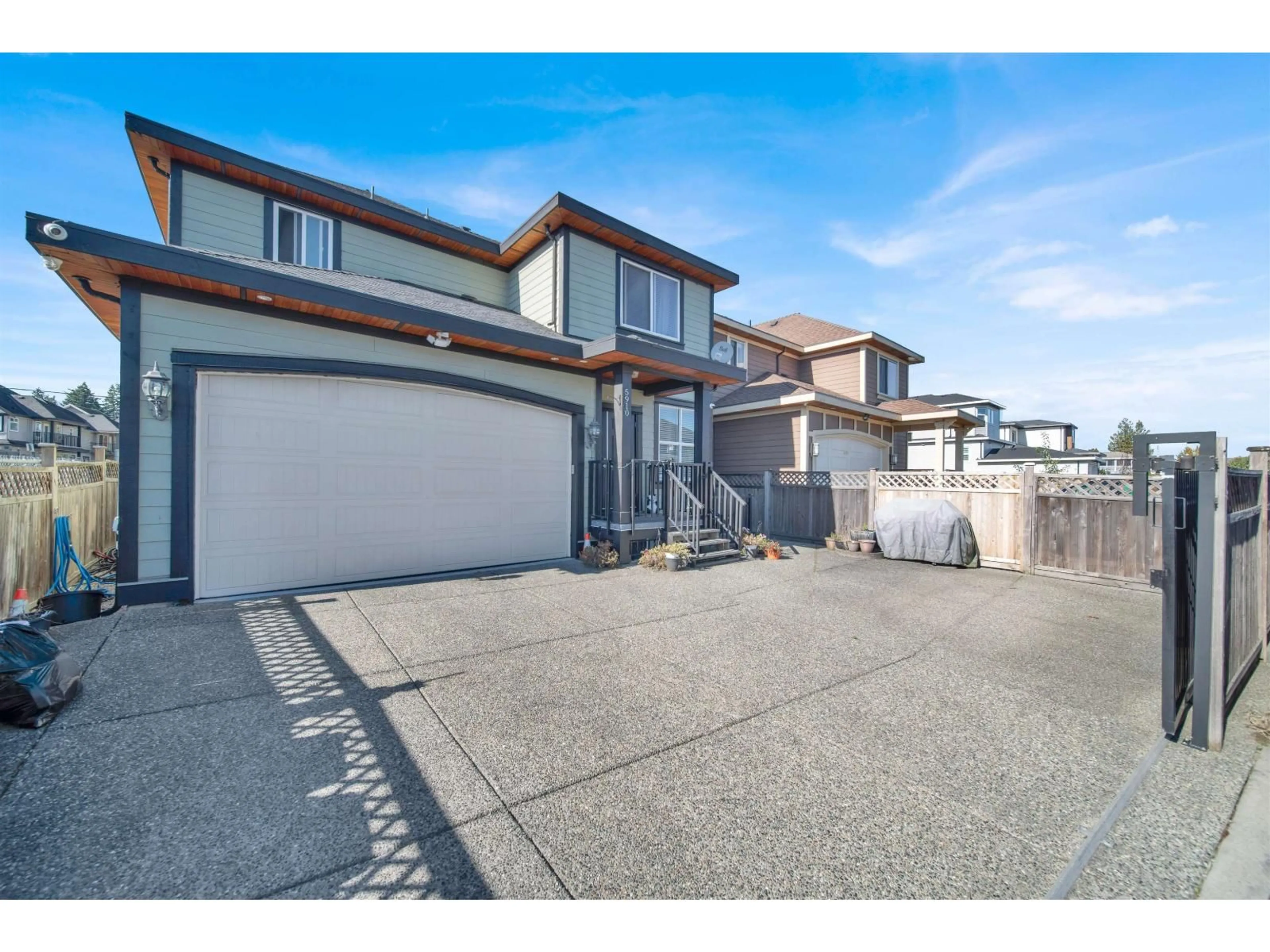 A pic from outside/outdoor area/front of a property/back of a property/a pic from drone, street for 5910 168, Surrey British Columbia V3S3X6
