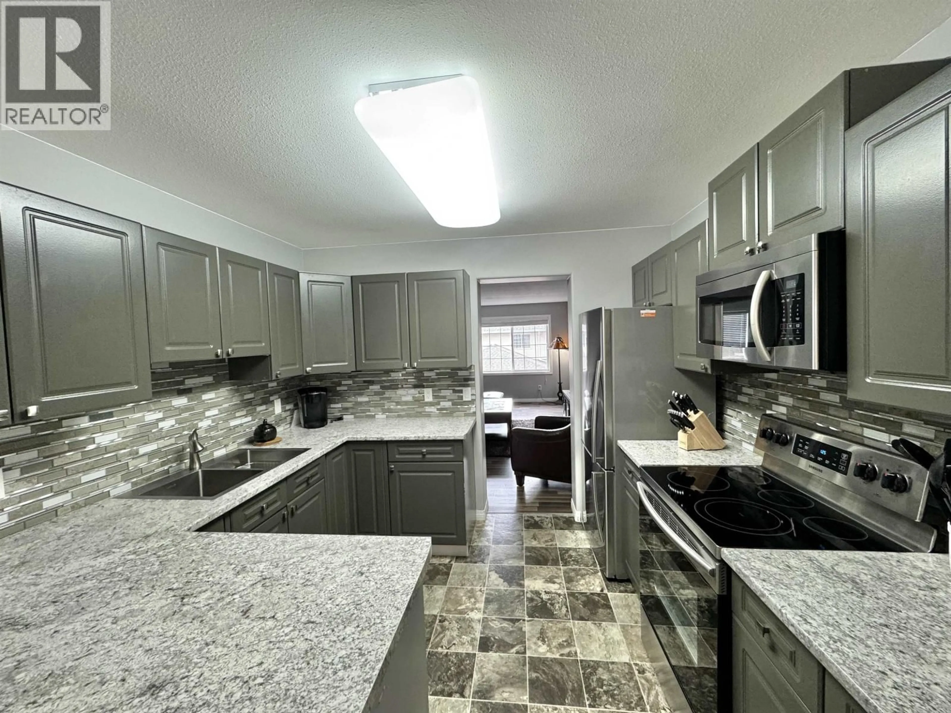 Open concept kitchen, ceramic/tile floor for 15 - 350 PEARKES DRIVE, Williams Lake British Columbia V2G4T2
