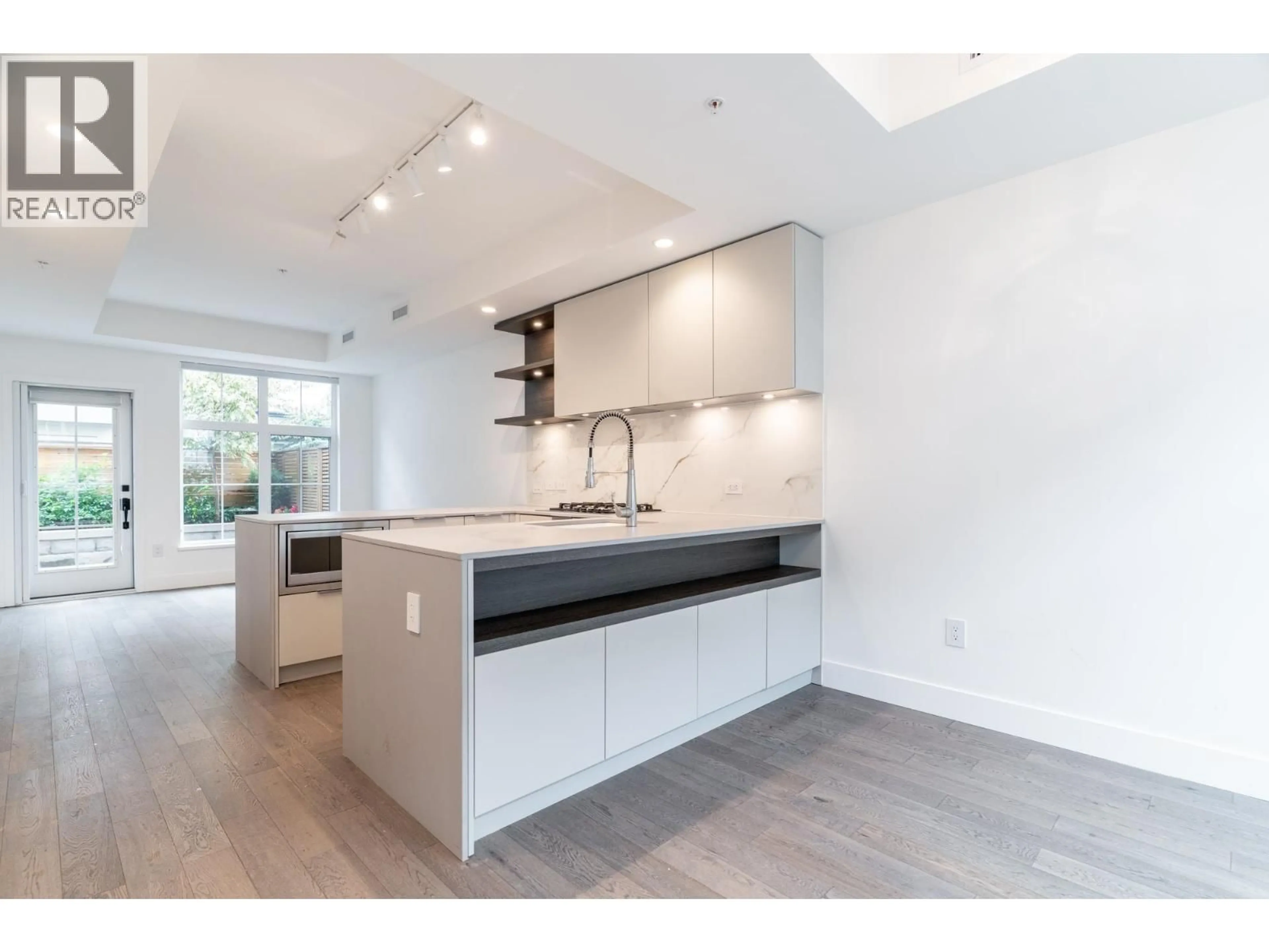 Open concept kitchen, unknown for 125 - 2070 CURLING ROAD, North Vancouver British Columbia V7P0C9