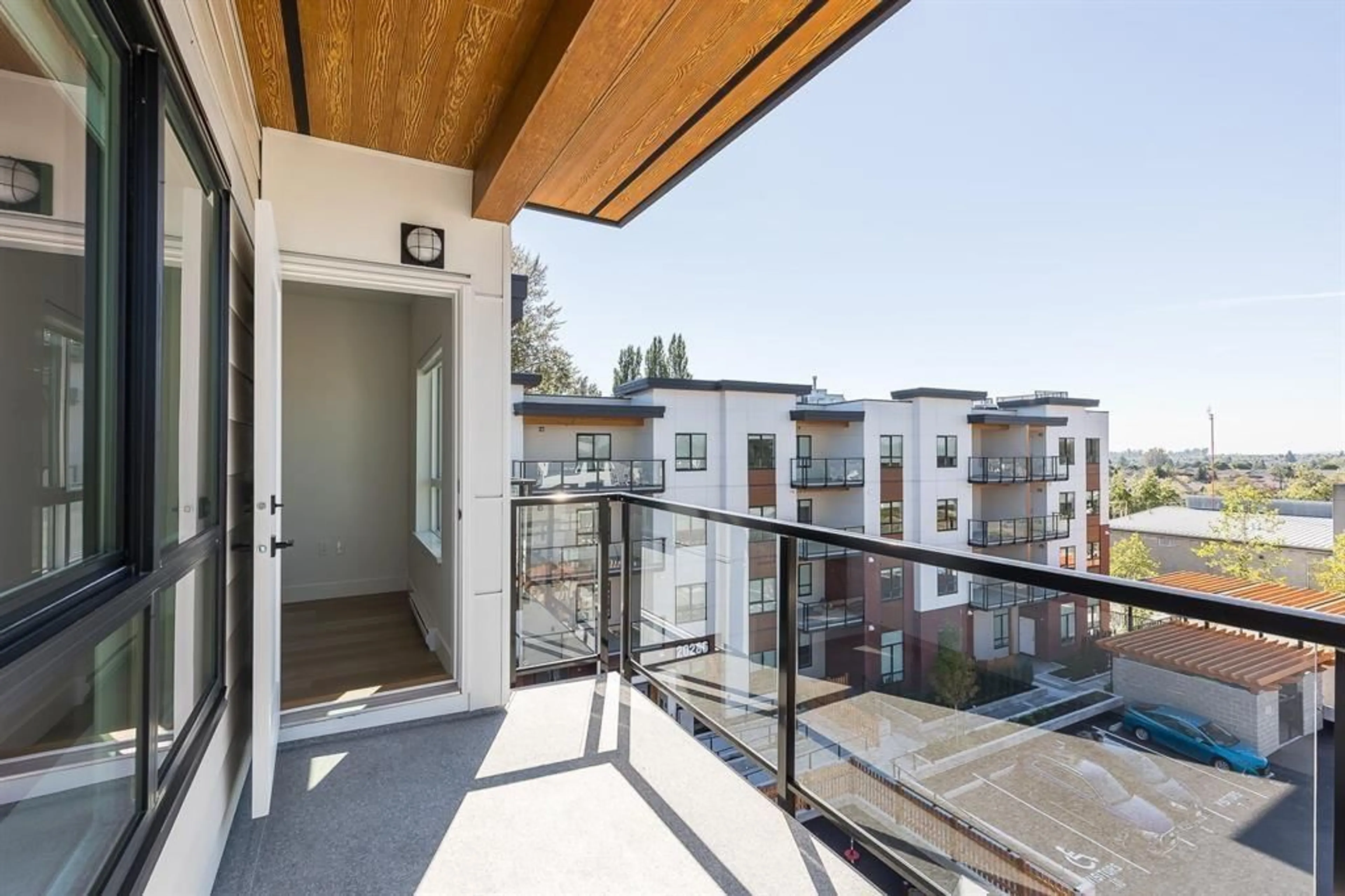 Balcony in the apartment, city buildings view from balcony for 404 - 20286 72B, Langley British Columbia V2Y3X4