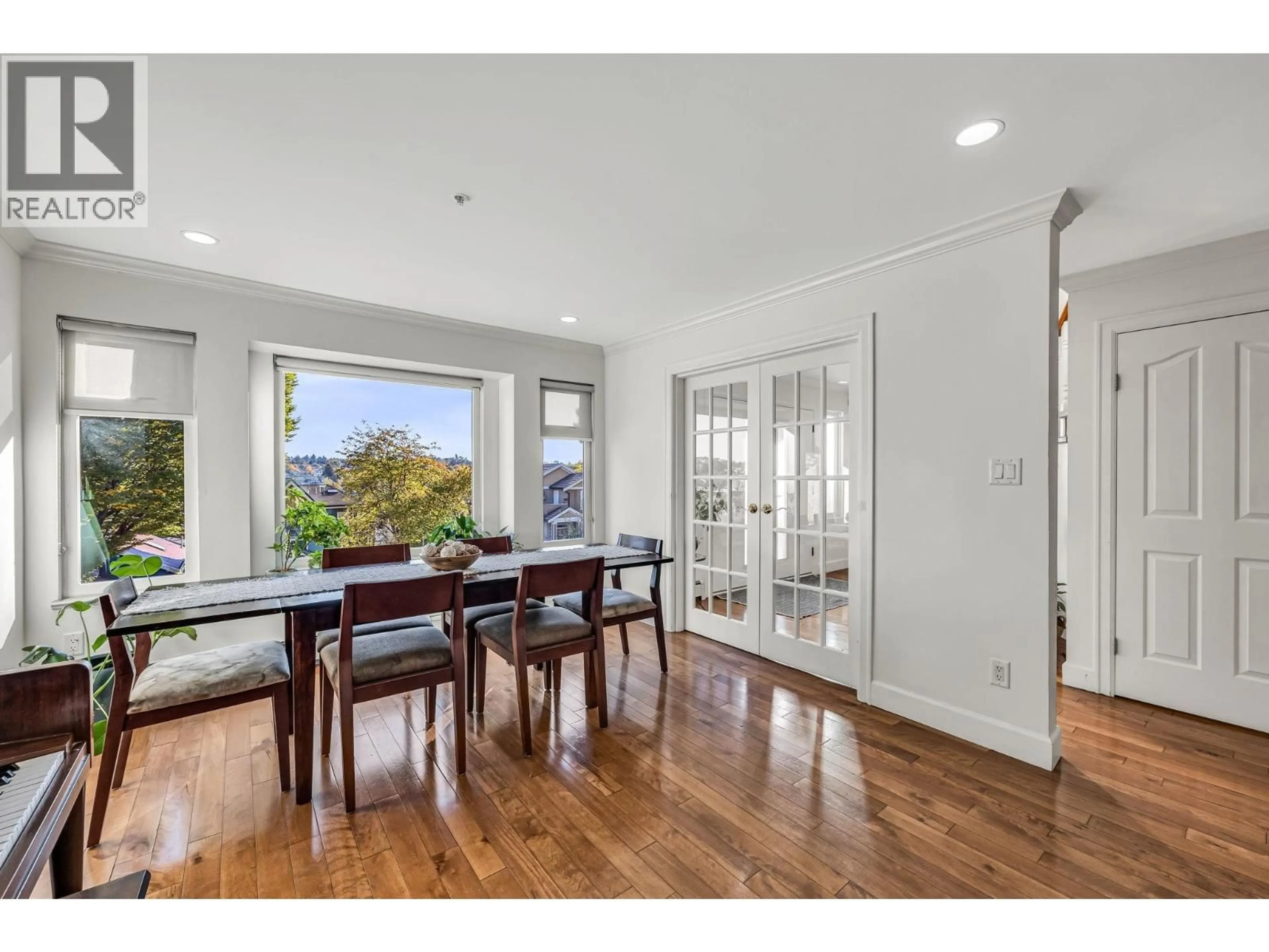 Dining room, wood/laminate floor for 3191 EIGHT AVENUE, Vancouver British Columbia V5M1X5