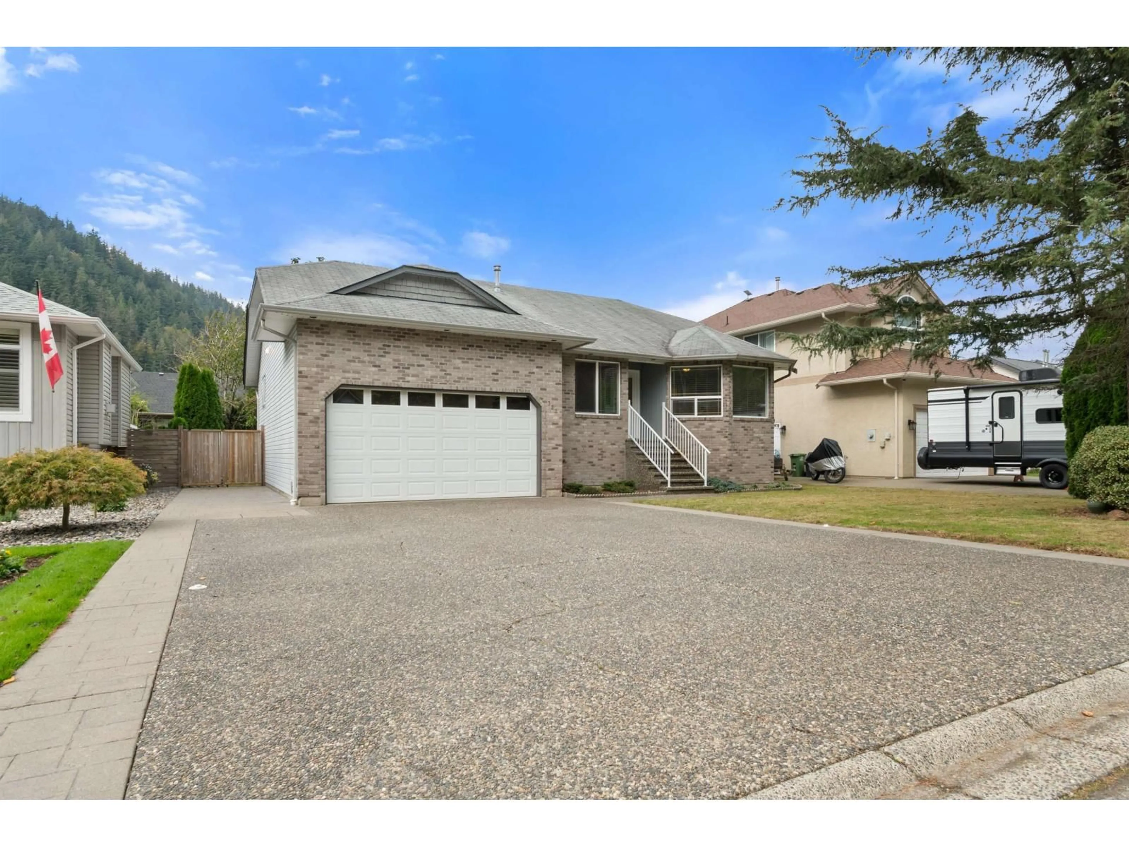 Home with vinyl exterior material, street for 322 MIAMI RIVER DRIVE, Harrison Hot Springs British Columbia V0M1K0