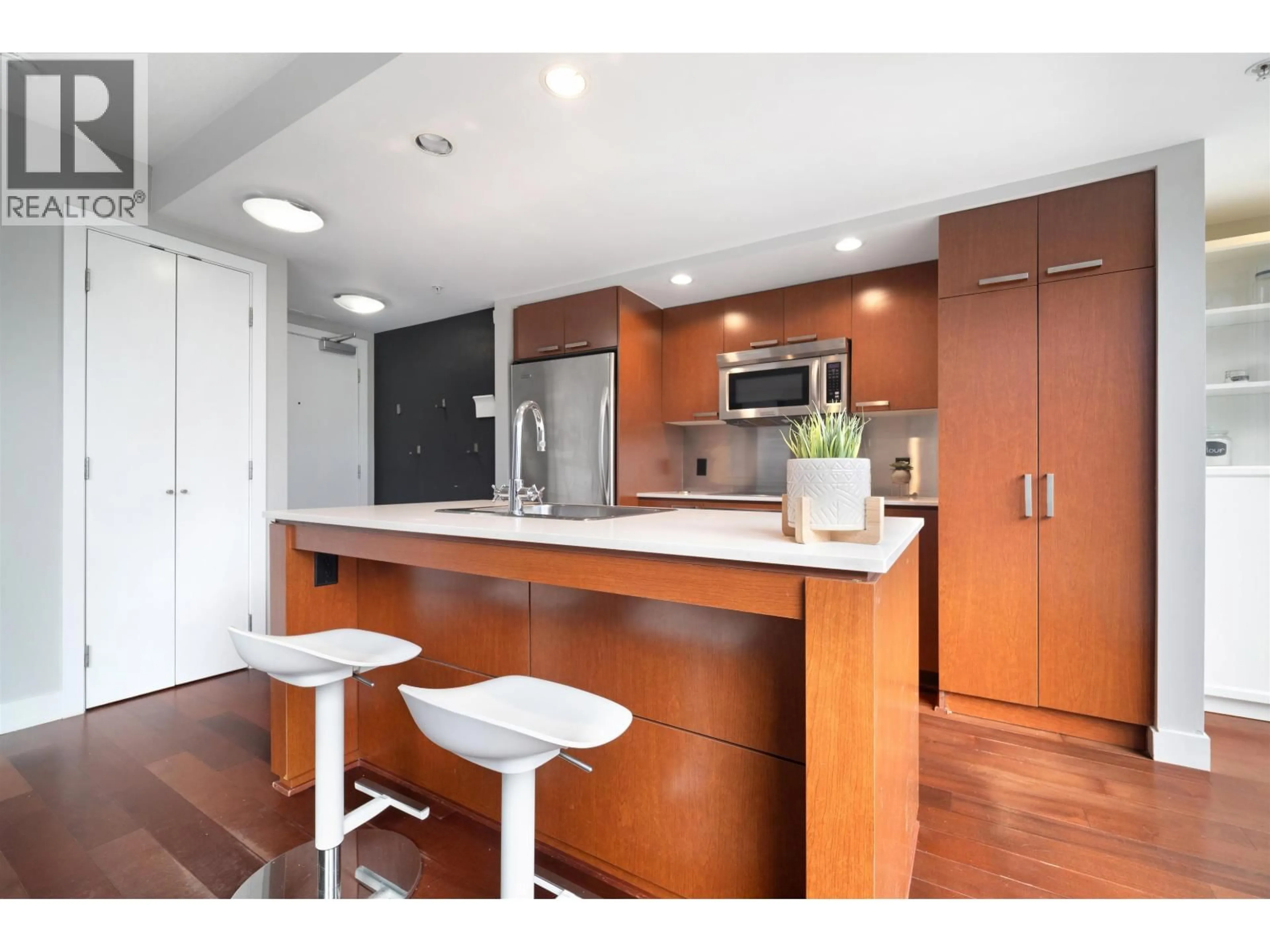Open concept kitchen, wood/laminate floor for 701 - 1255 SEYMOUR STREET, Vancouver British Columbia V7J2J8