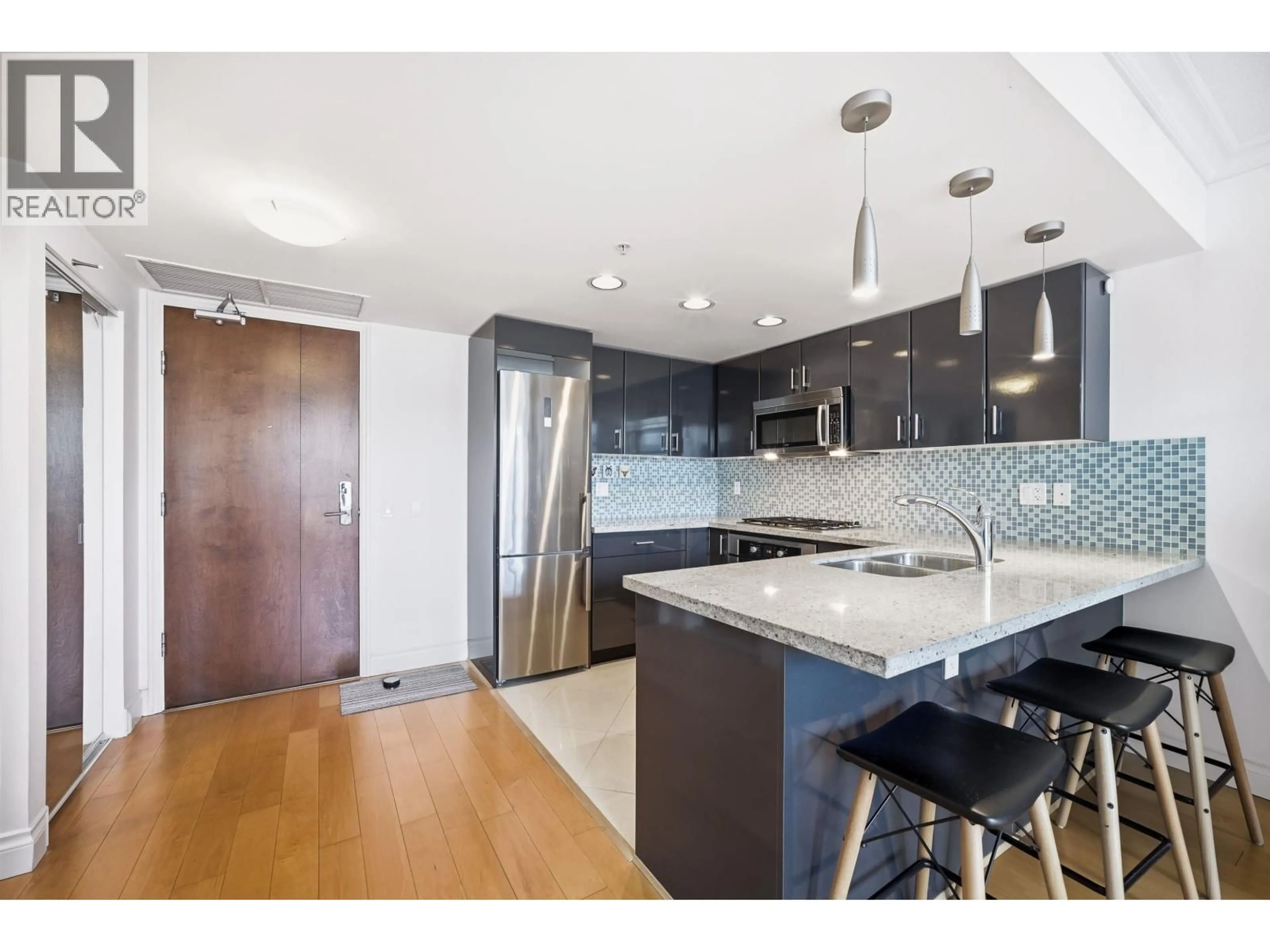 Open concept kitchen, unknown for 708 - 133 ESPLANADE, North Vancouver British Columbia V7L1A1