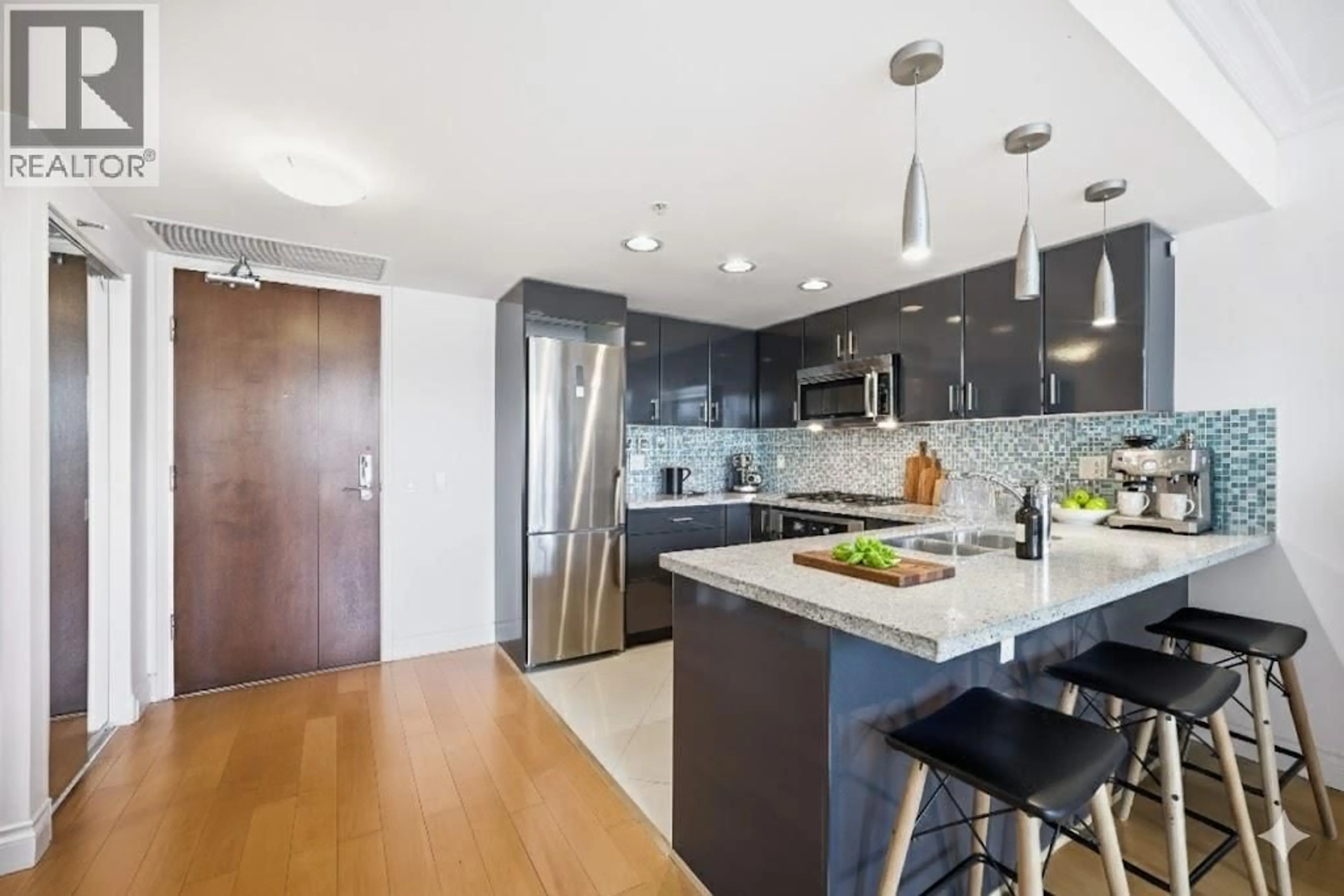 Contemporary kitchen, unknown for 708 - 133 ESPLANADE, North Vancouver British Columbia V7L1A1