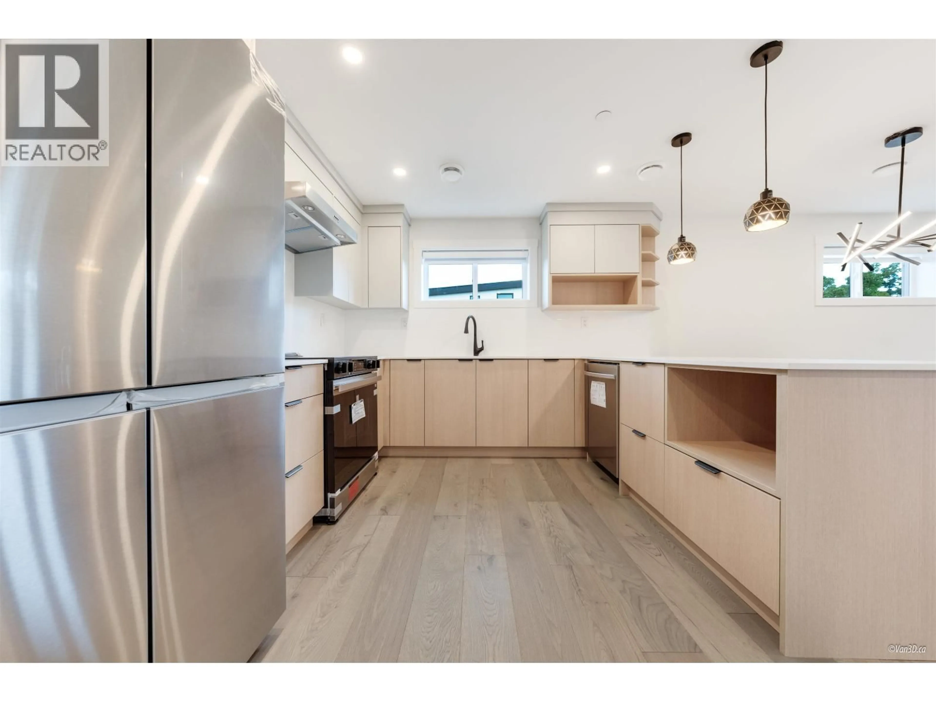 Open concept kitchen, unknown for 202 - 5092 SLOCAN STREET, Vancouver British Columbia V5R2A5