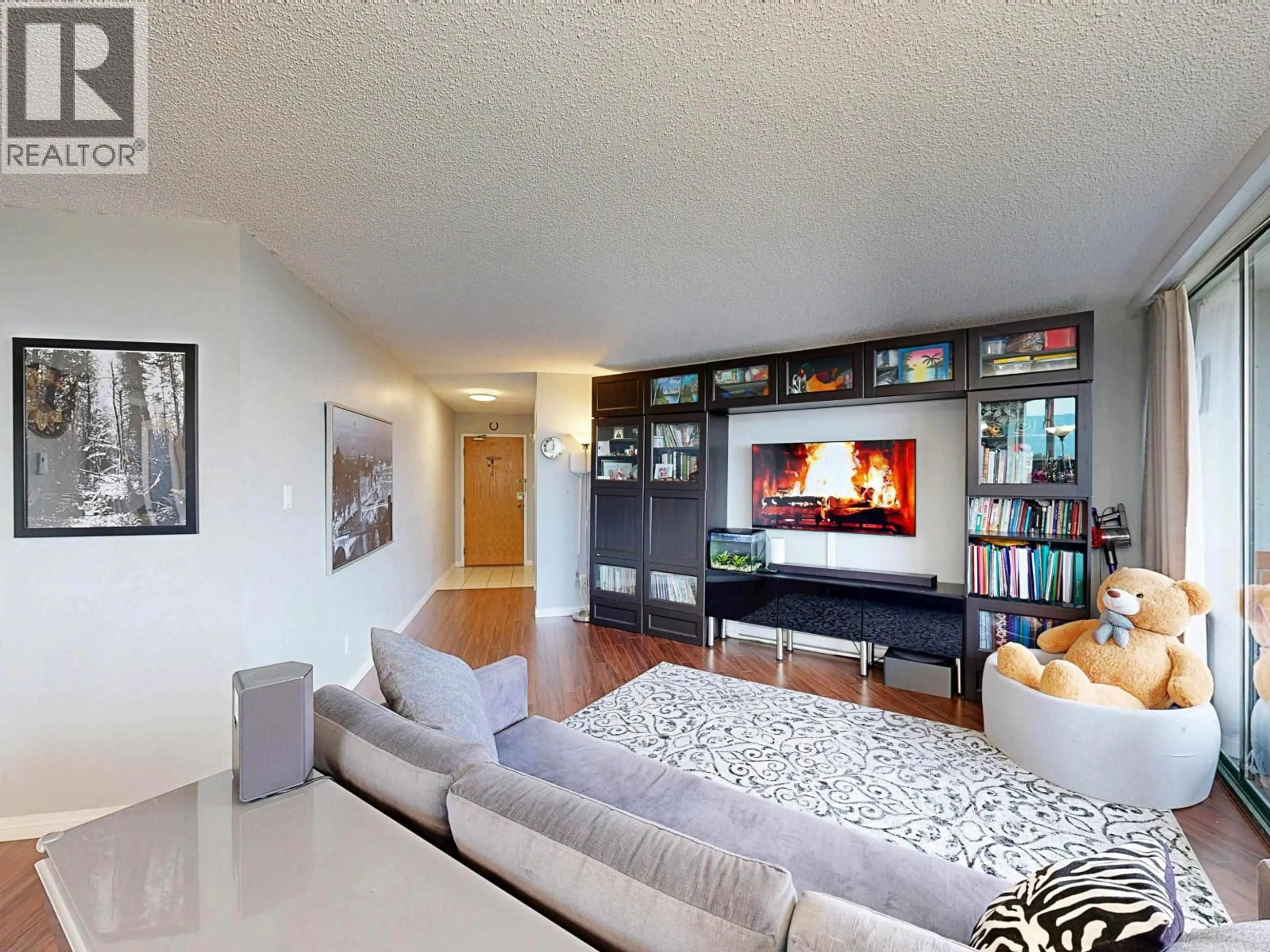Living room with furniture, unknown for 802 - 3920 HASTINGS STREET, Burnaby British Columbia V5C6C7
