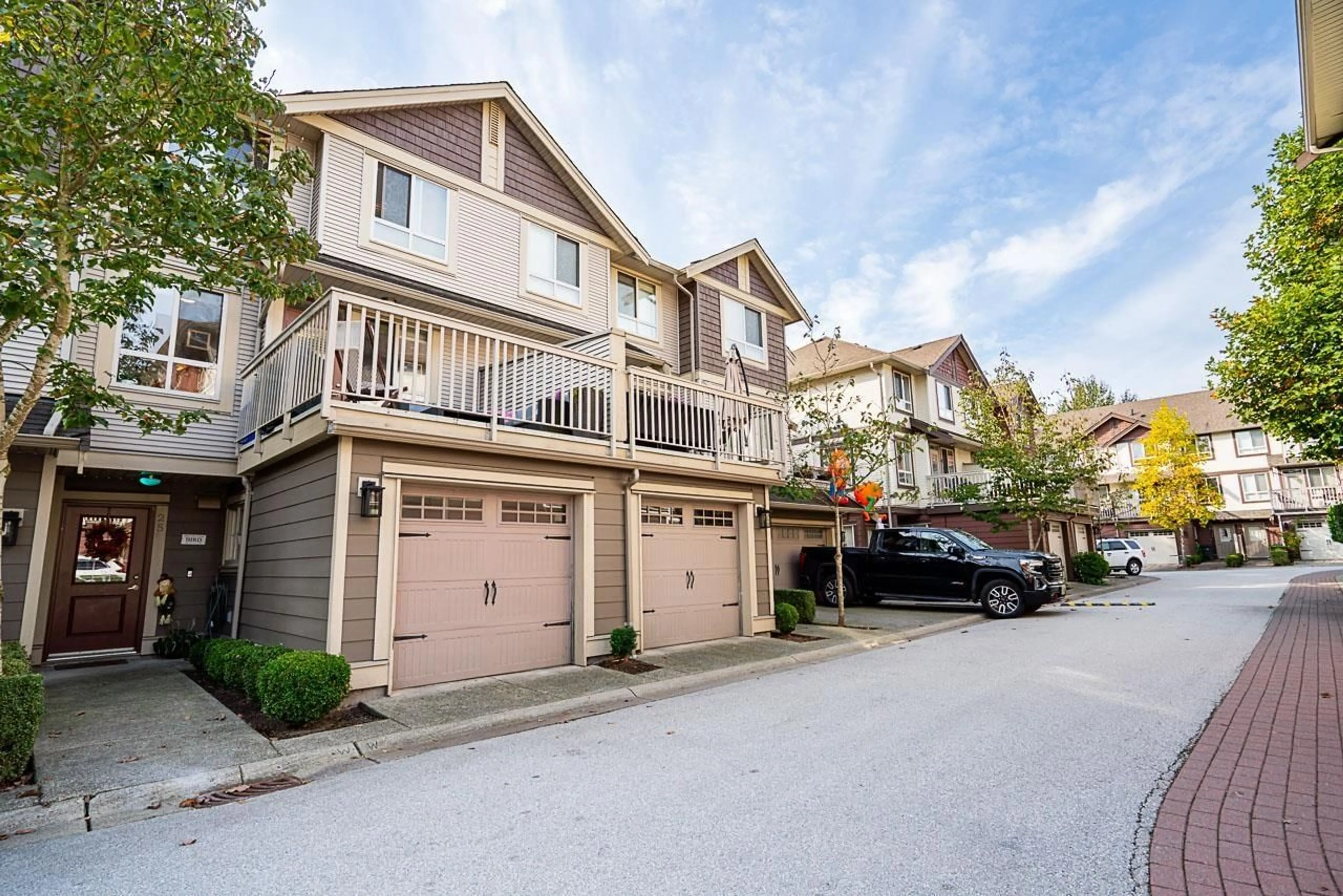 A pic from outside/outdoor area/front of a property/back of a property/a pic from drone, street for 25 - 19560 68, Surrey British Columbia V4N5Y5