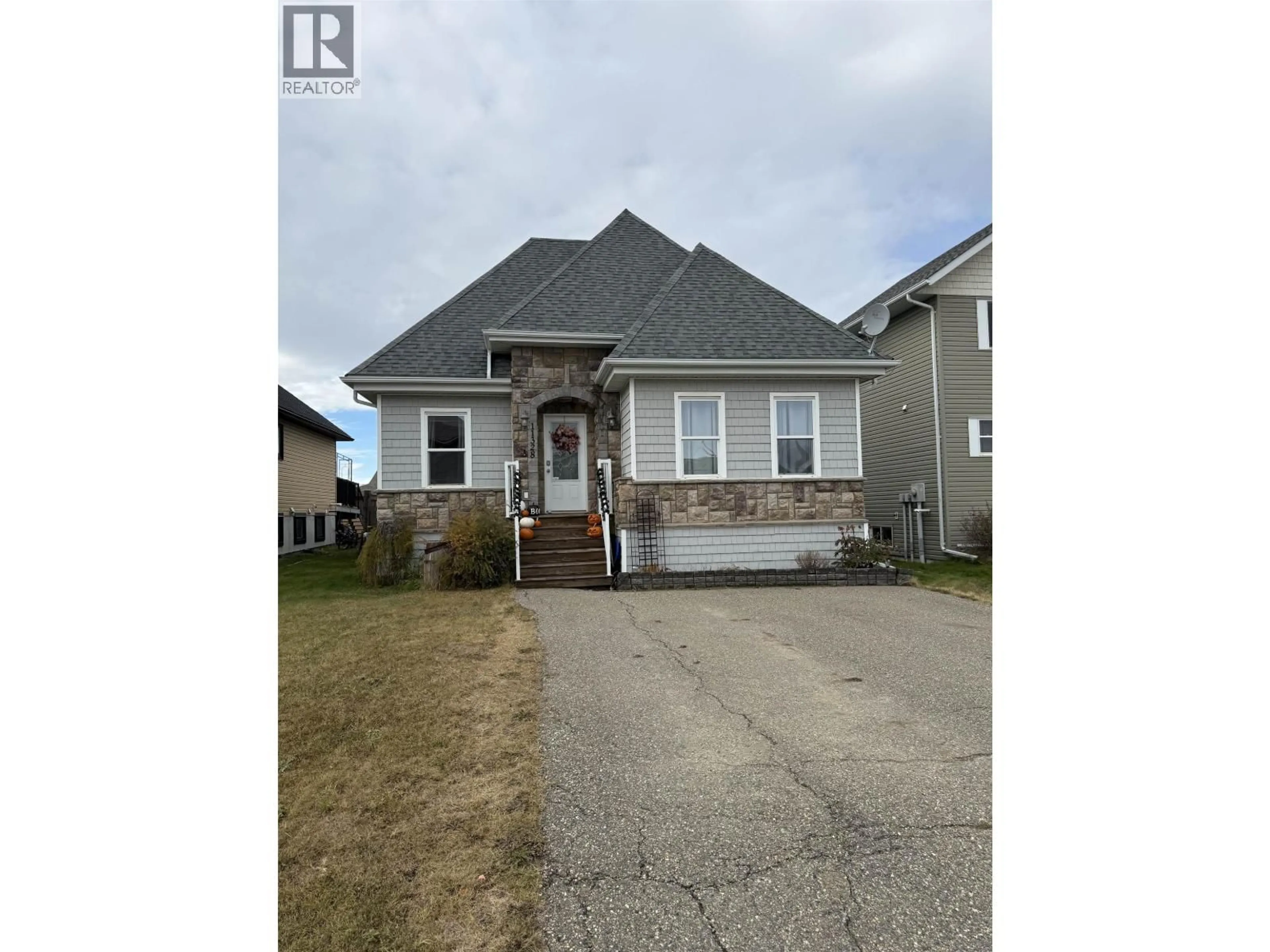 A pic from outside/outdoor area/front of a property/back of a property/a pic from drone, street for 11328 86A STREET, Fort St. John British Columbia V1J0G2