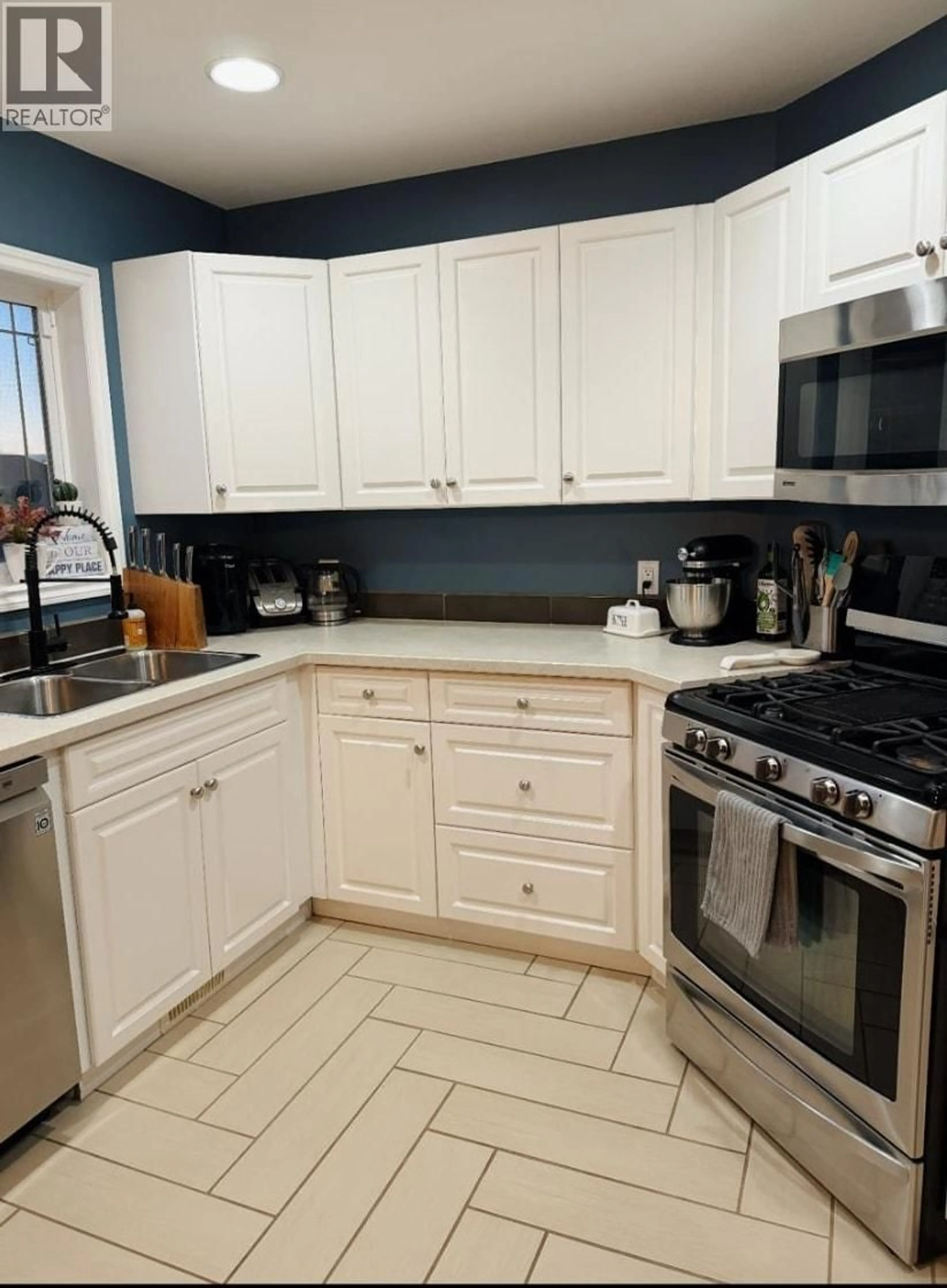 Standard kitchen, ceramic/tile floor for 11328 86A STREET, Fort St. John British Columbia V1J0G2