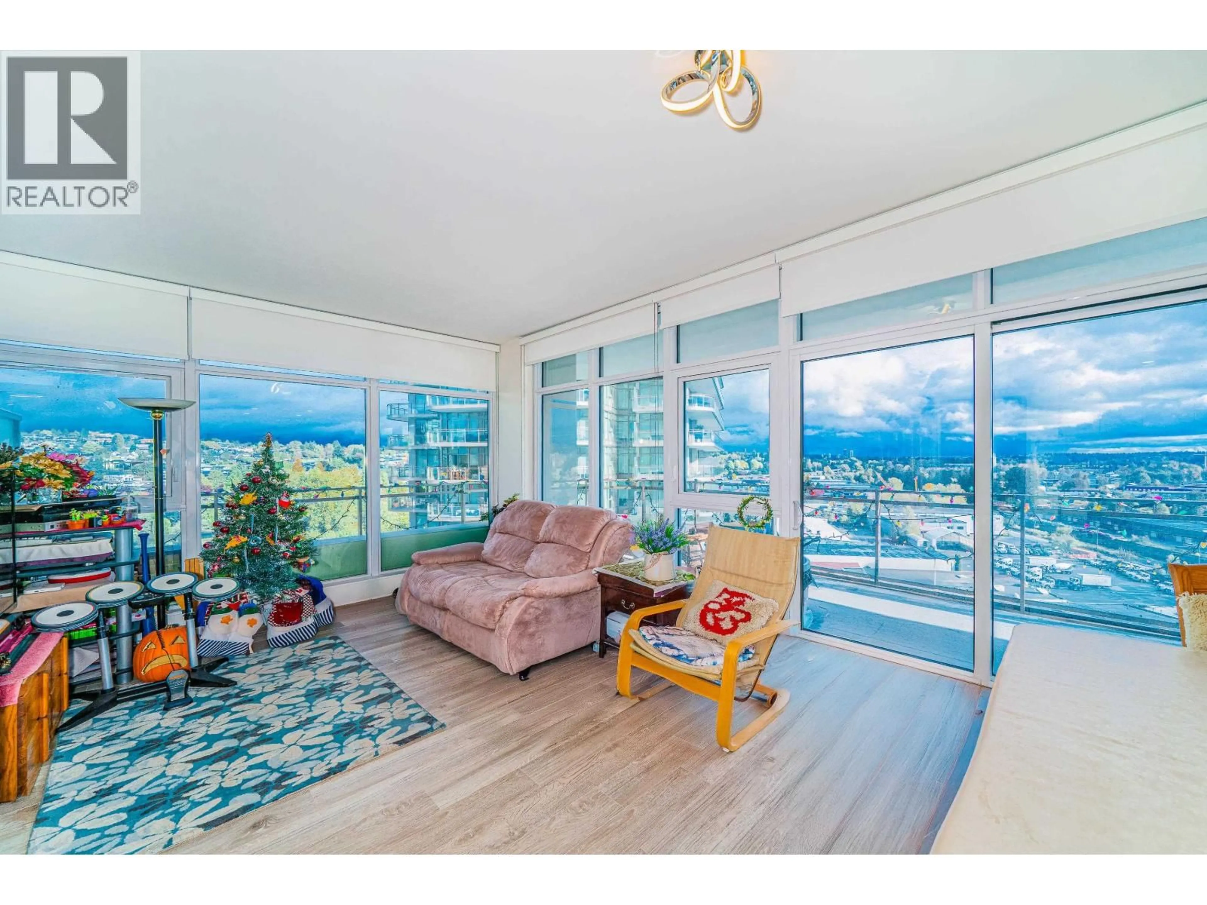 Living room with furniture, wood/laminate floor for 1305 - 5311 GORING STREET, Burnaby British Columbia V5B0B5