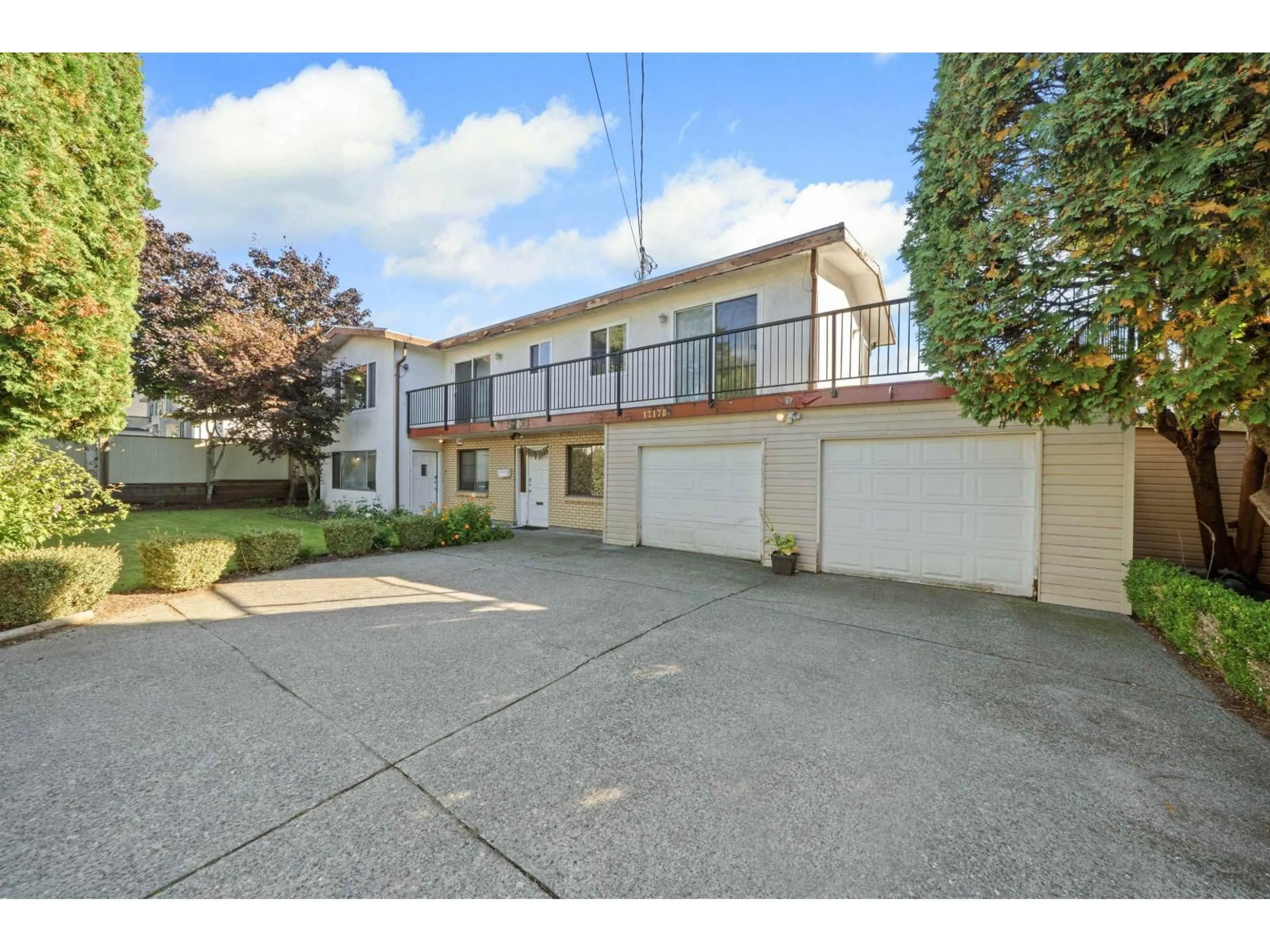 A pic from outside/outdoor area/front of a property/back of a property/a pic from drone, street for 12178 97, Surrey British Columbia V3V2C9