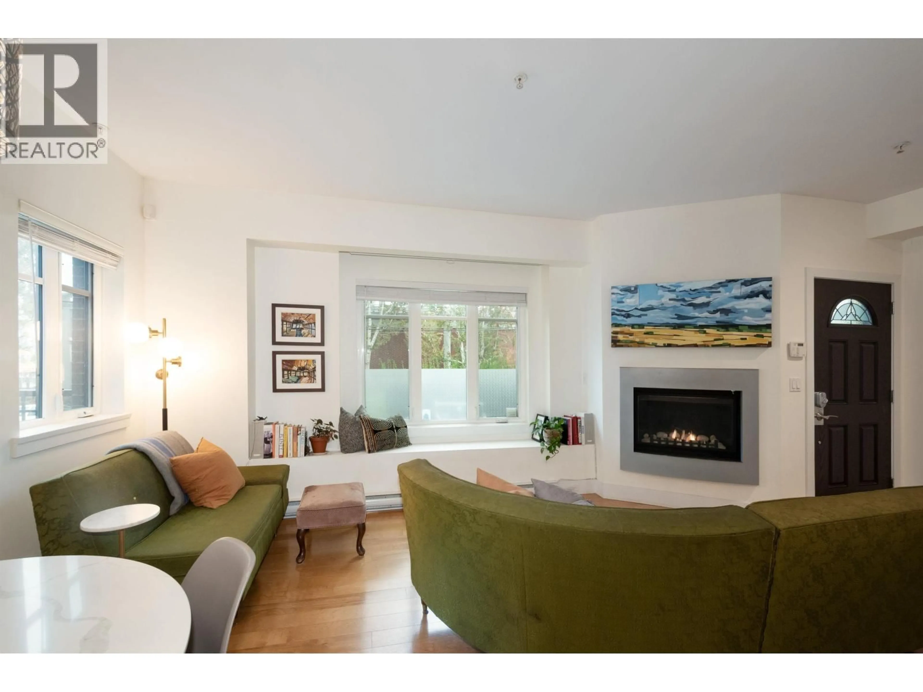 Living room with furniture, wood/laminate floor for 468 5TH AVENUE, Vancouver British Columbia V5T1H9