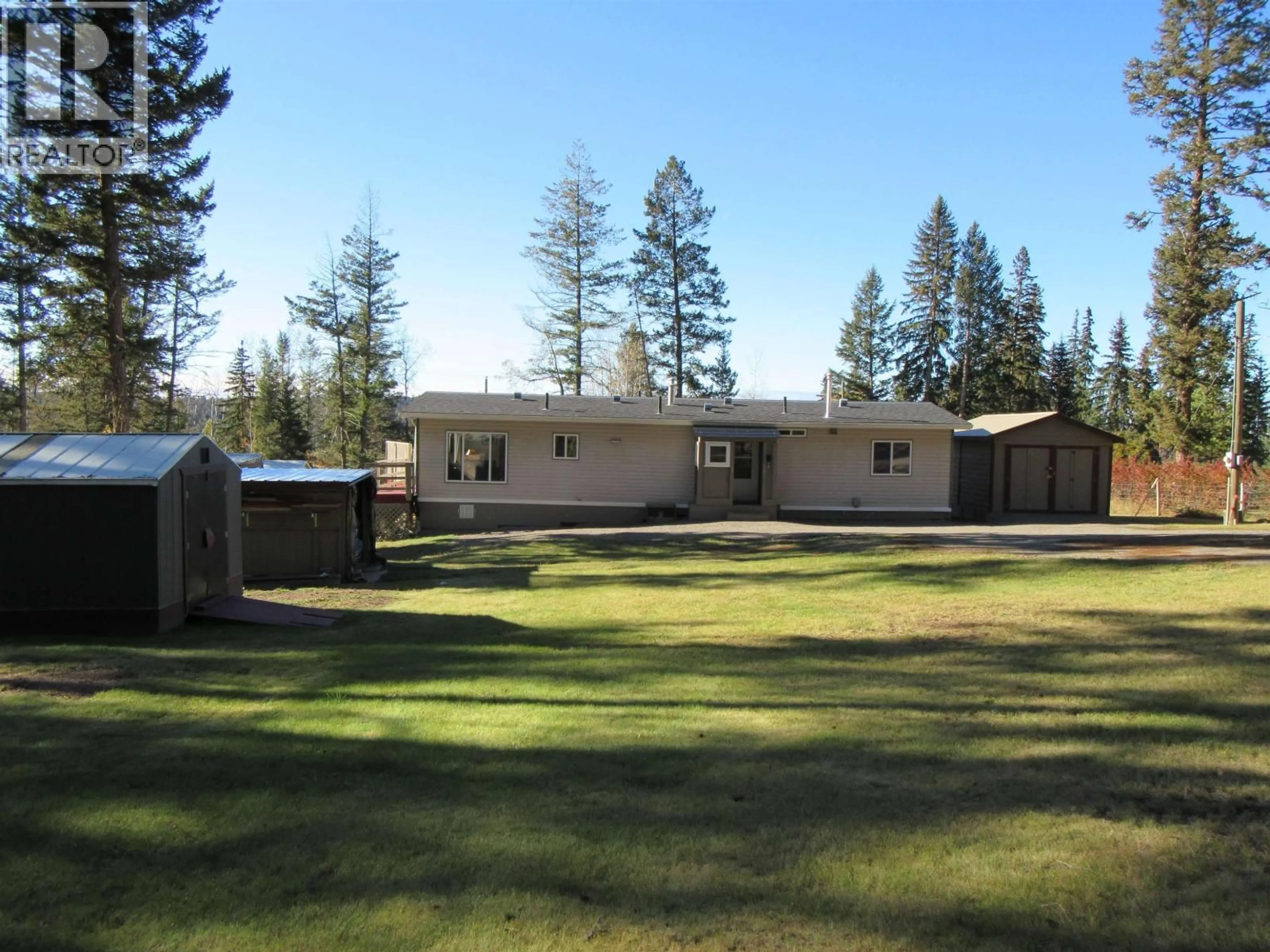 A pic from outside/outdoor area/front of a property/back of a property/a pic from drone, unknown for 4866 KEMMI CRESCENT, 108 Mile Ranch British Columbia V0K2Z0
