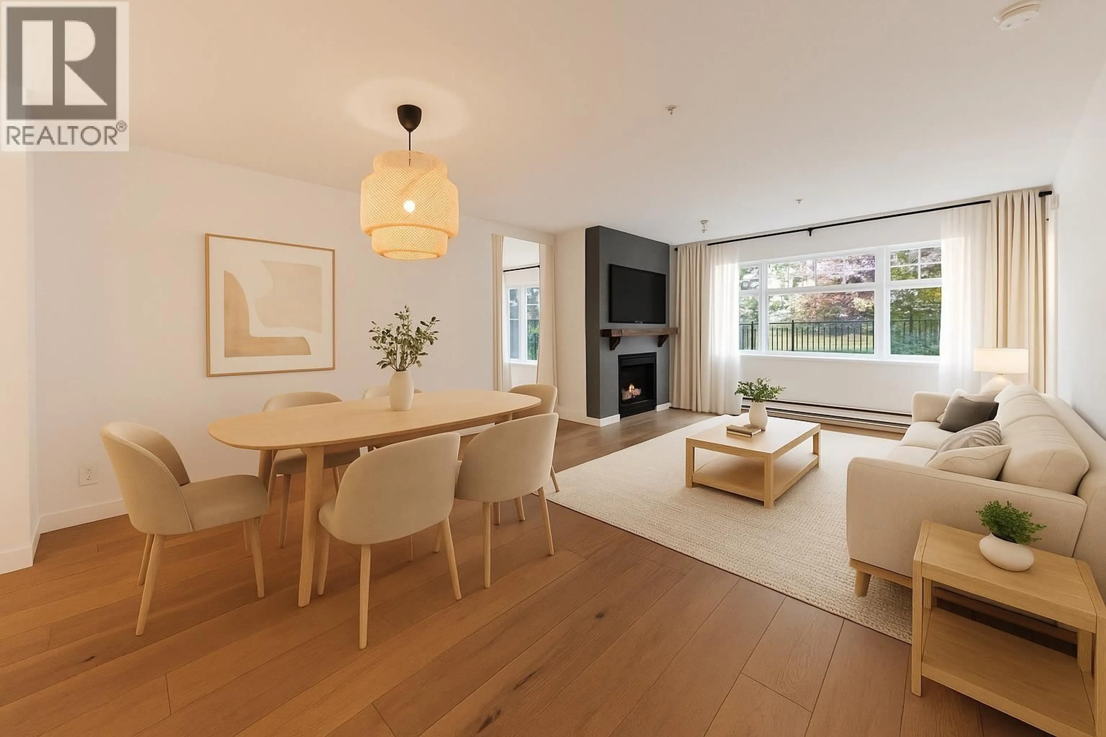Living room with furniture, wood/laminate floor for 111 - 1432 PARKWAY BOULEVARD, Coquitlam British Columbia V3E3L9