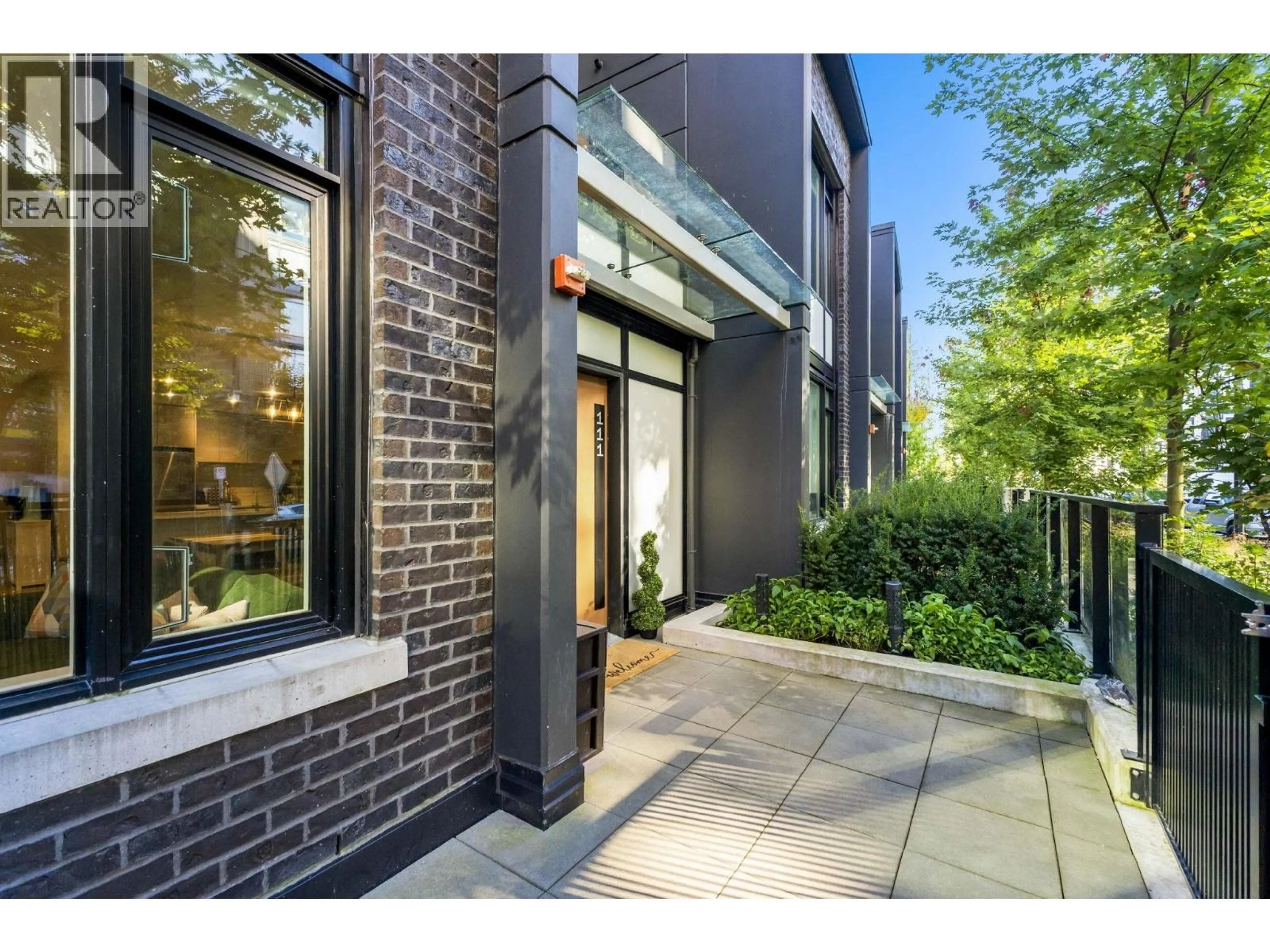Home with brick exterior material, street for 111 - 8761 UNIVERSITY CRESCENT, Burnaby British Columbia V5A0G3