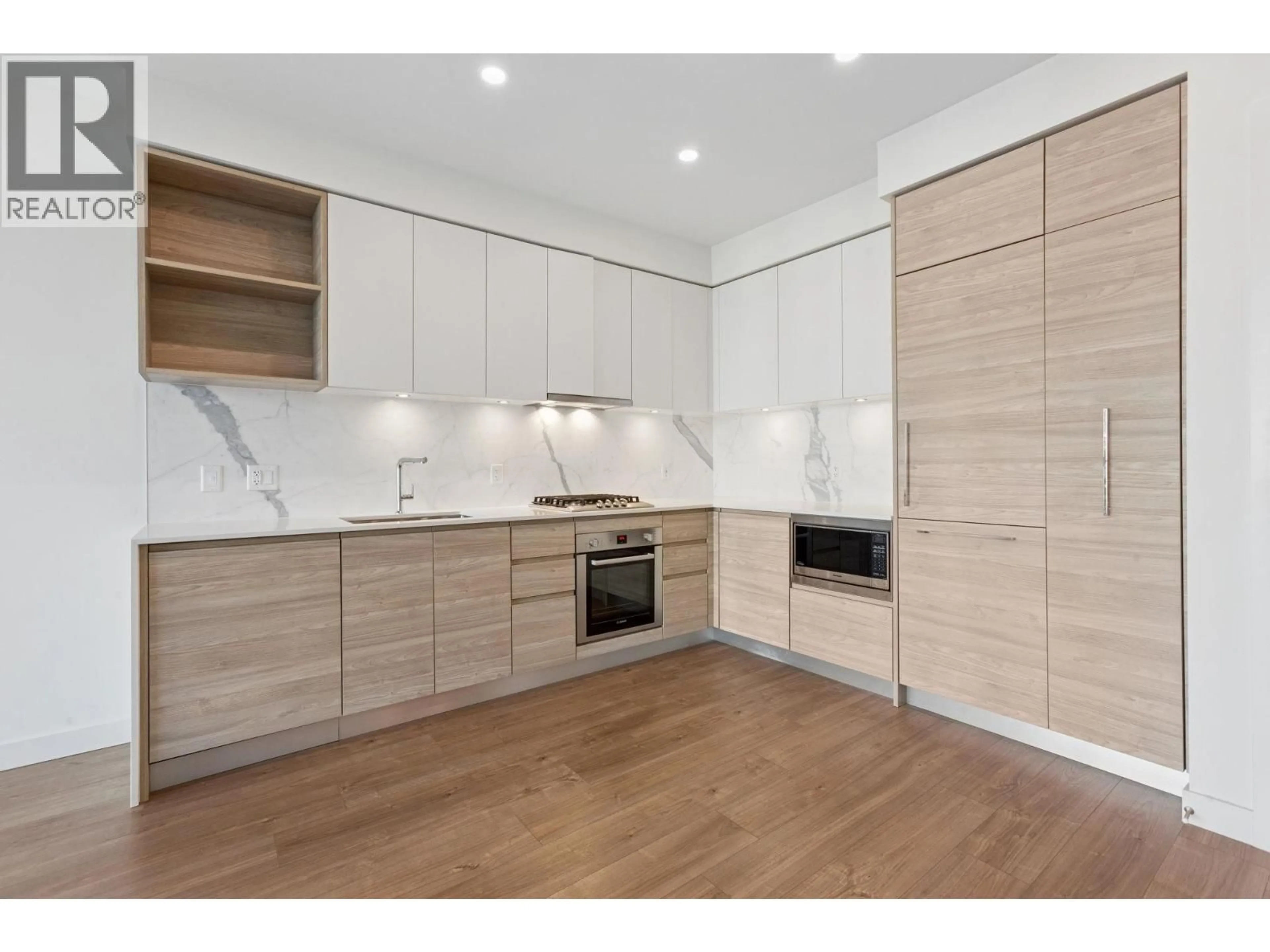 Open concept kitchen, wood/laminate floor for 708 - 585 AUSTIN AVENUE, Coquitlam British Columbia V3K0G6