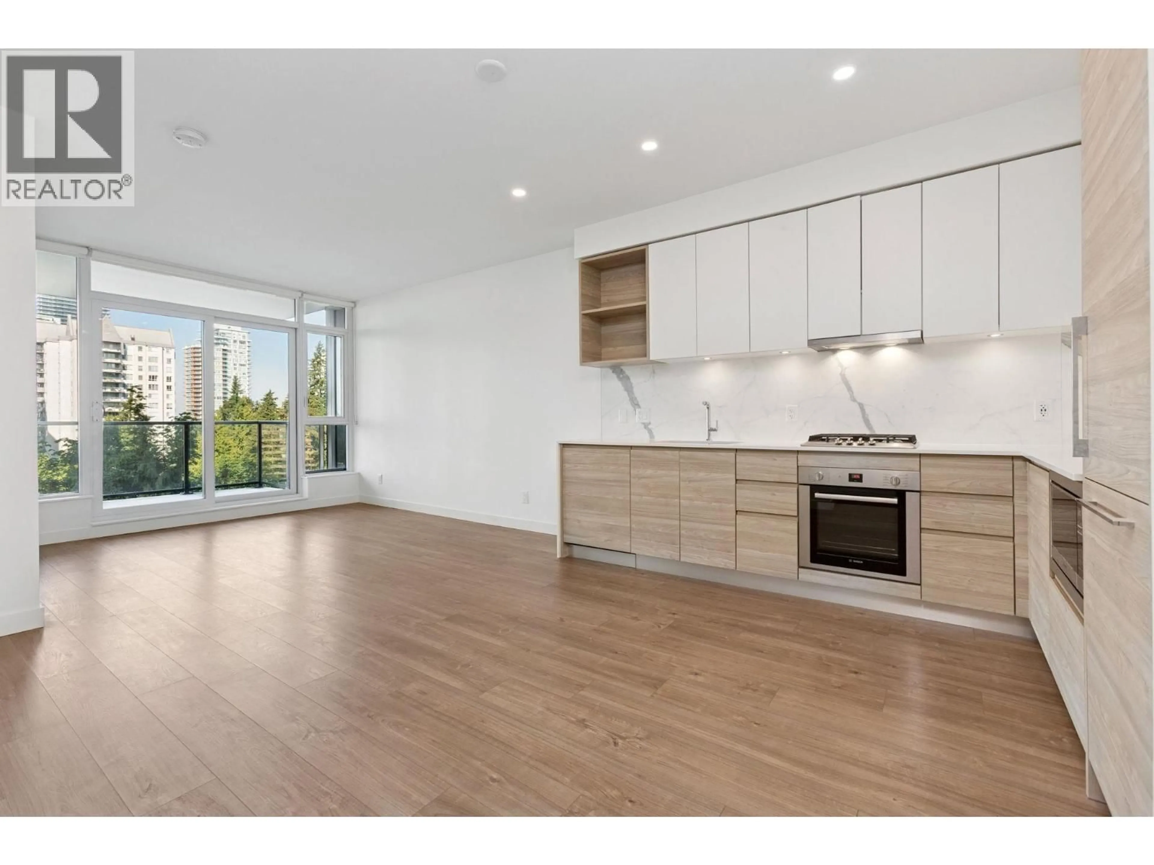 Open concept kitchen, wood/laminate floor for 708 - 585 AUSTIN AVENUE, Coquitlam British Columbia V3K0G6