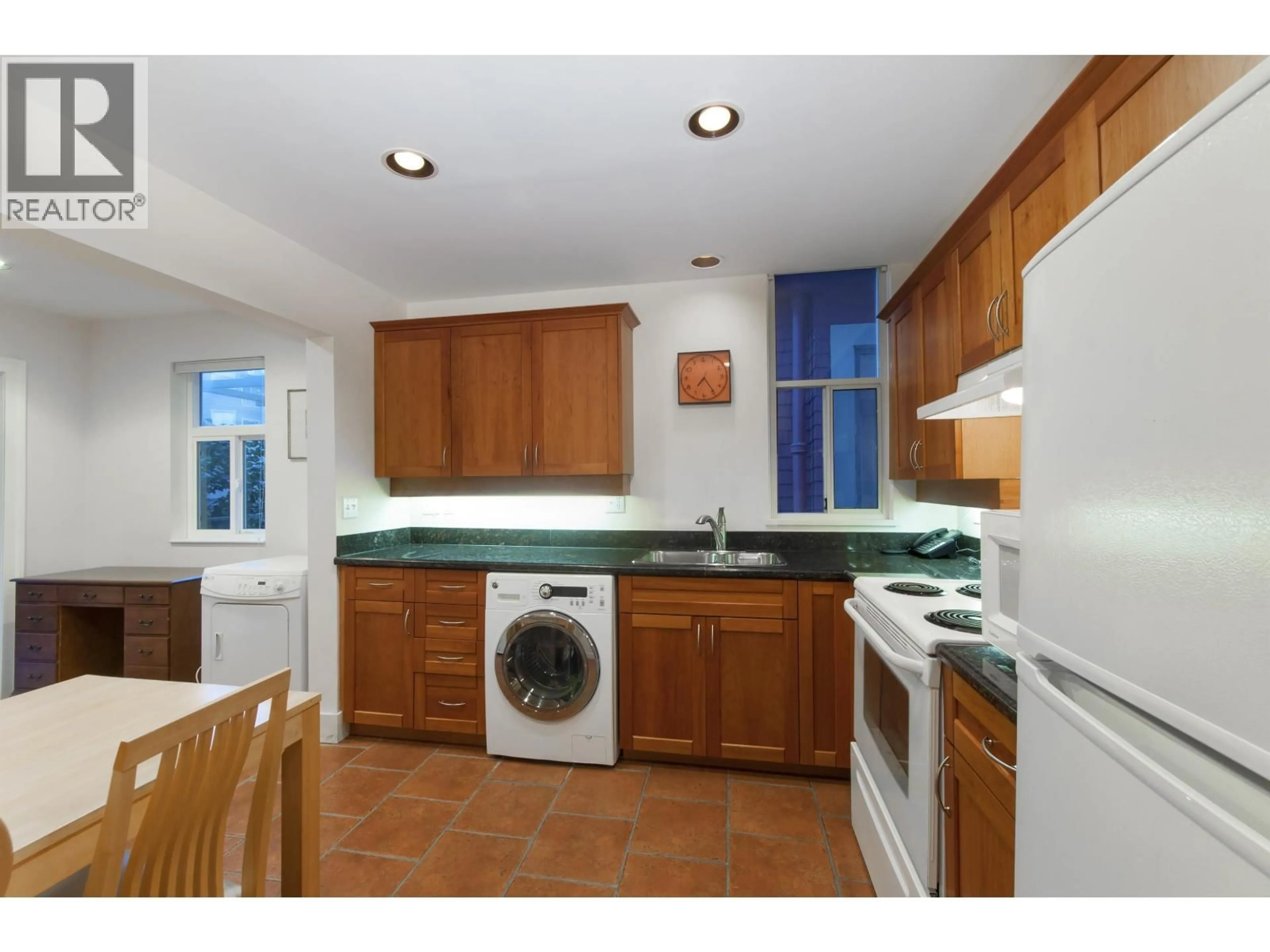 Standard kitchen, ceramic/tile floor for 3316 3RD AVENUE, Vancouver British Columbia V6R1L4