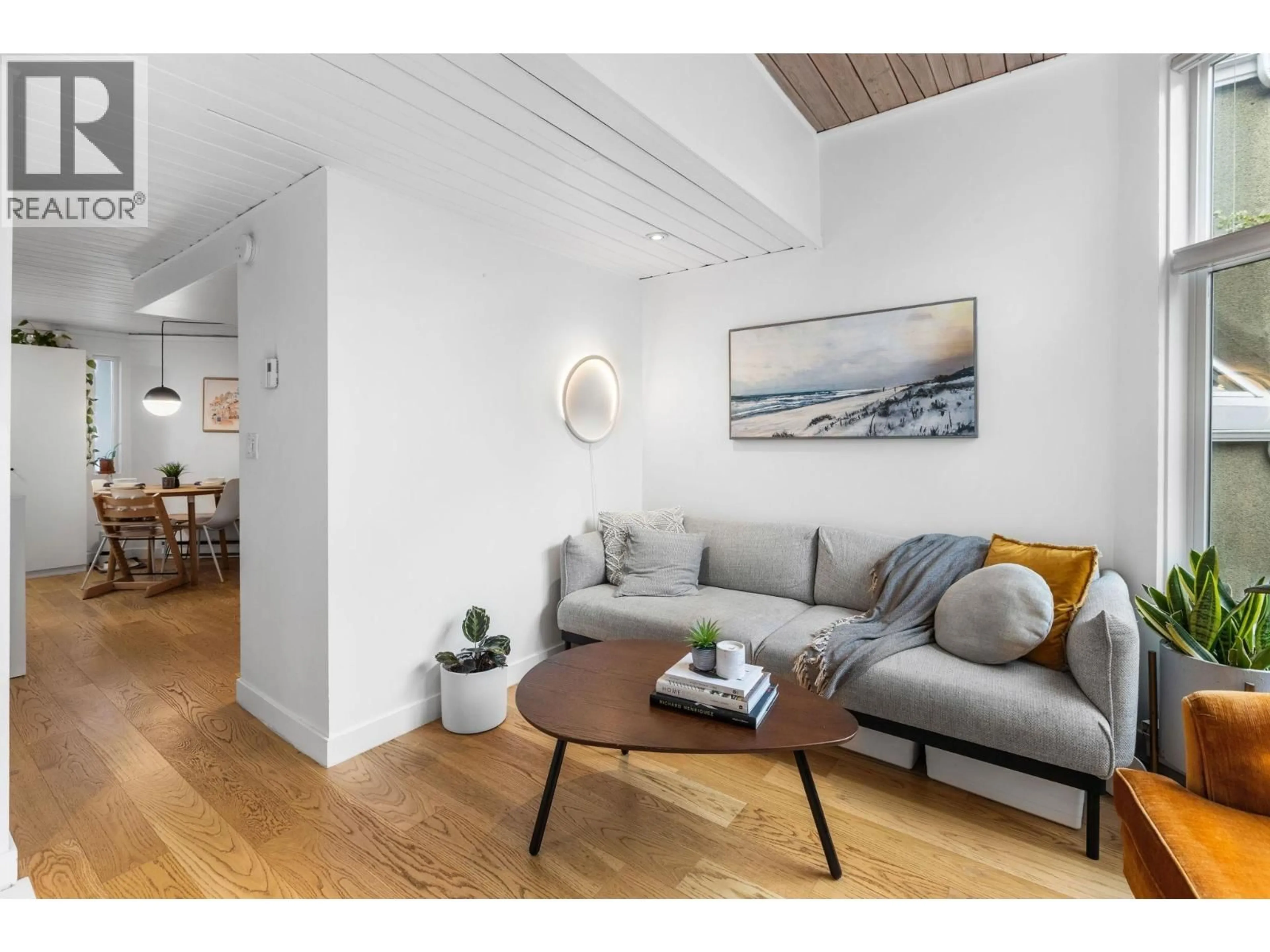 Living room with furniture, wood/laminate floor for 212 - 1045 8TH AVENUE, Vancouver British Columbia V6H1C3