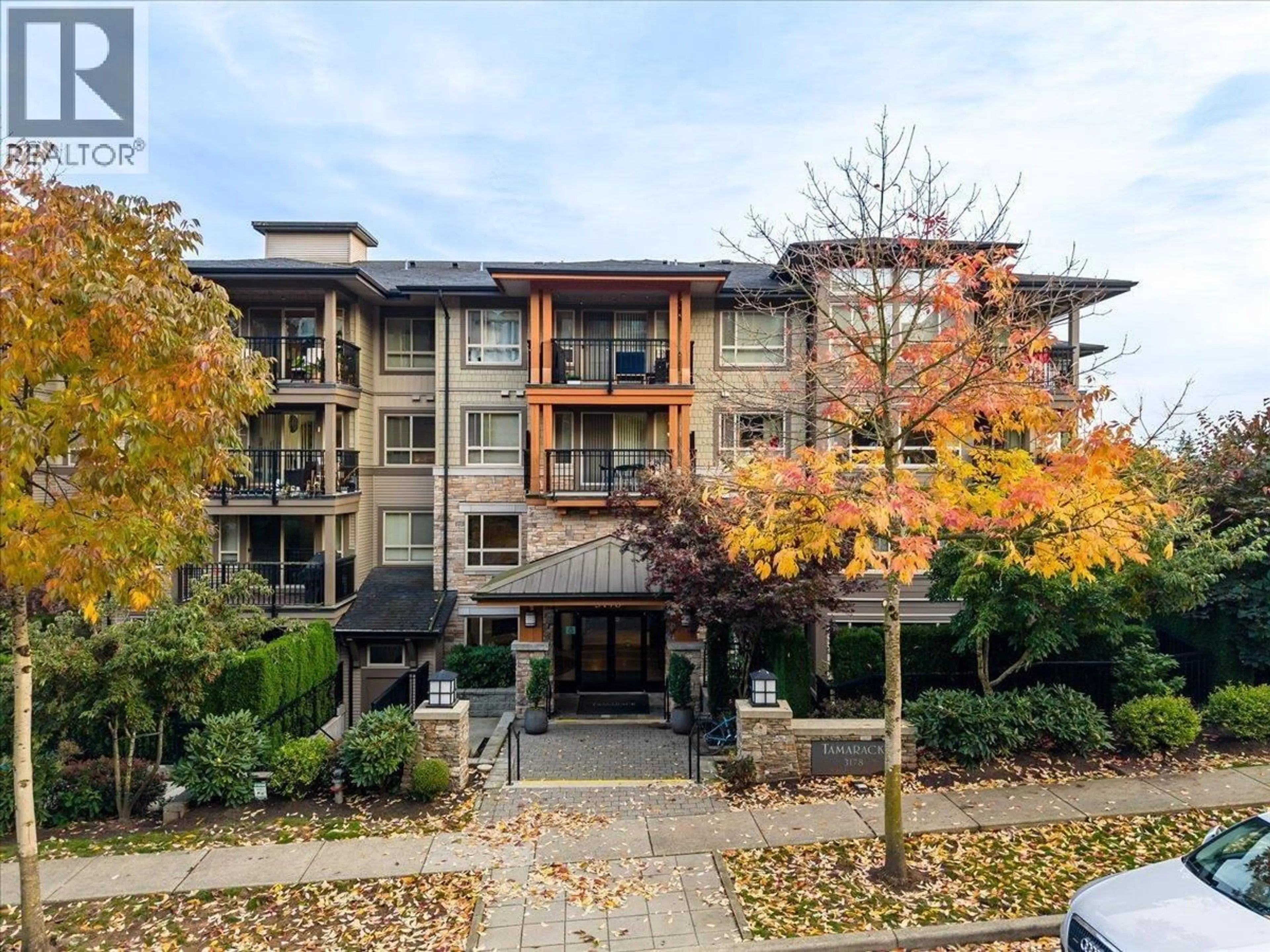 A pic from outside/outdoor area/front of a property/back of a property/a pic from drone, building for 315 - 3178 DAYANEE SPRINGS BOULEVARD, Coquitlam British Columbia V3E0B9