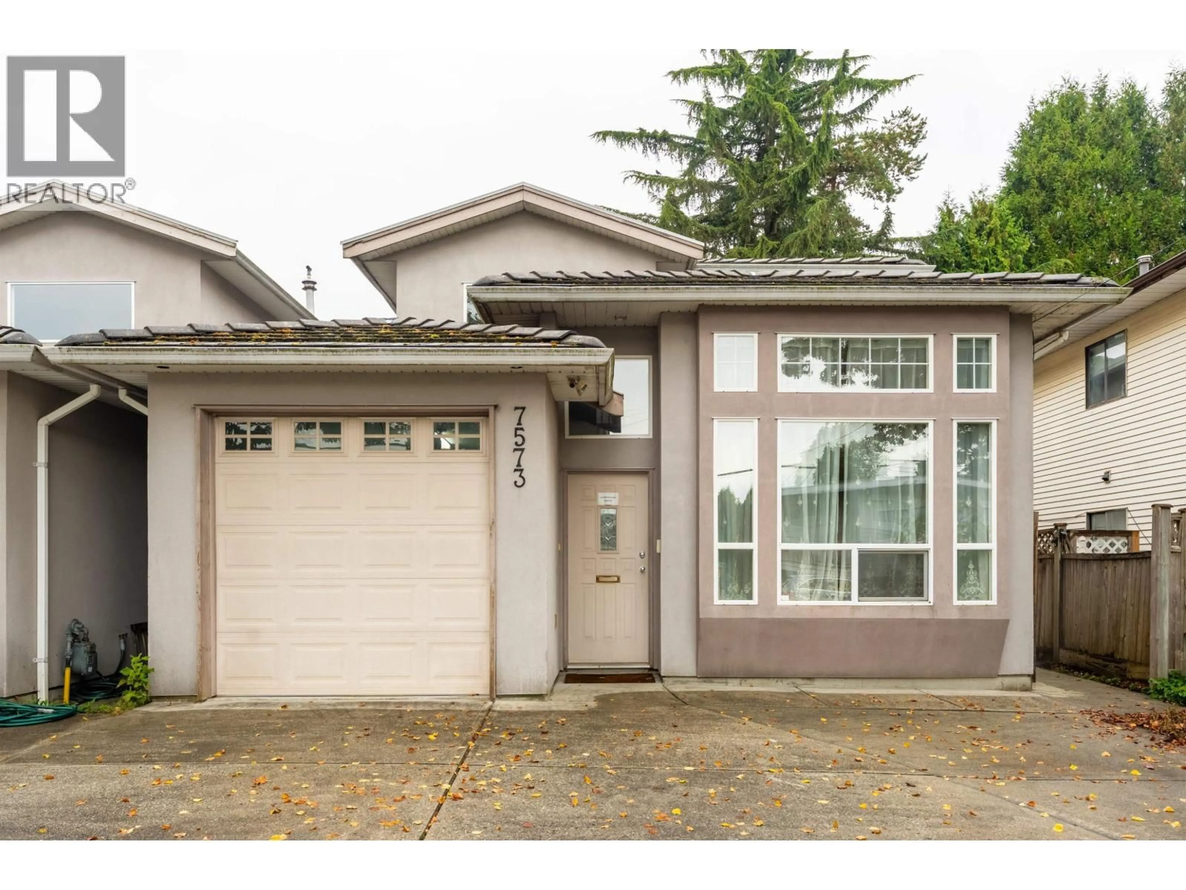 Home with vinyl exterior material, street for 7573 17TH AVENUE, Burnaby British Columbia V3N1L6