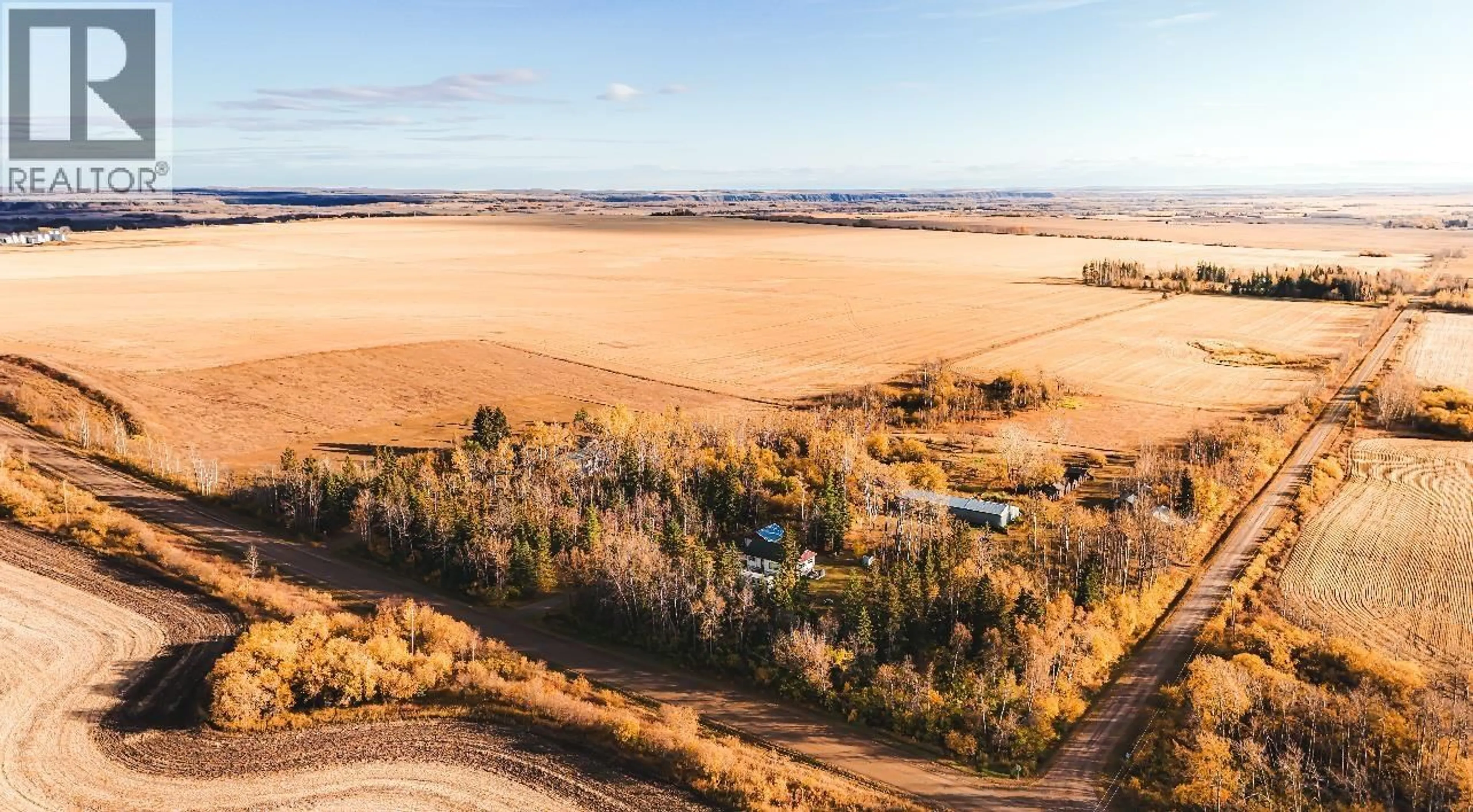 A pic from outside/outdoor area/front of a property/back of a property/a pic from drone, unknown for 7137 PINE ROAD, Fort St. John British Columbia V1J4J1