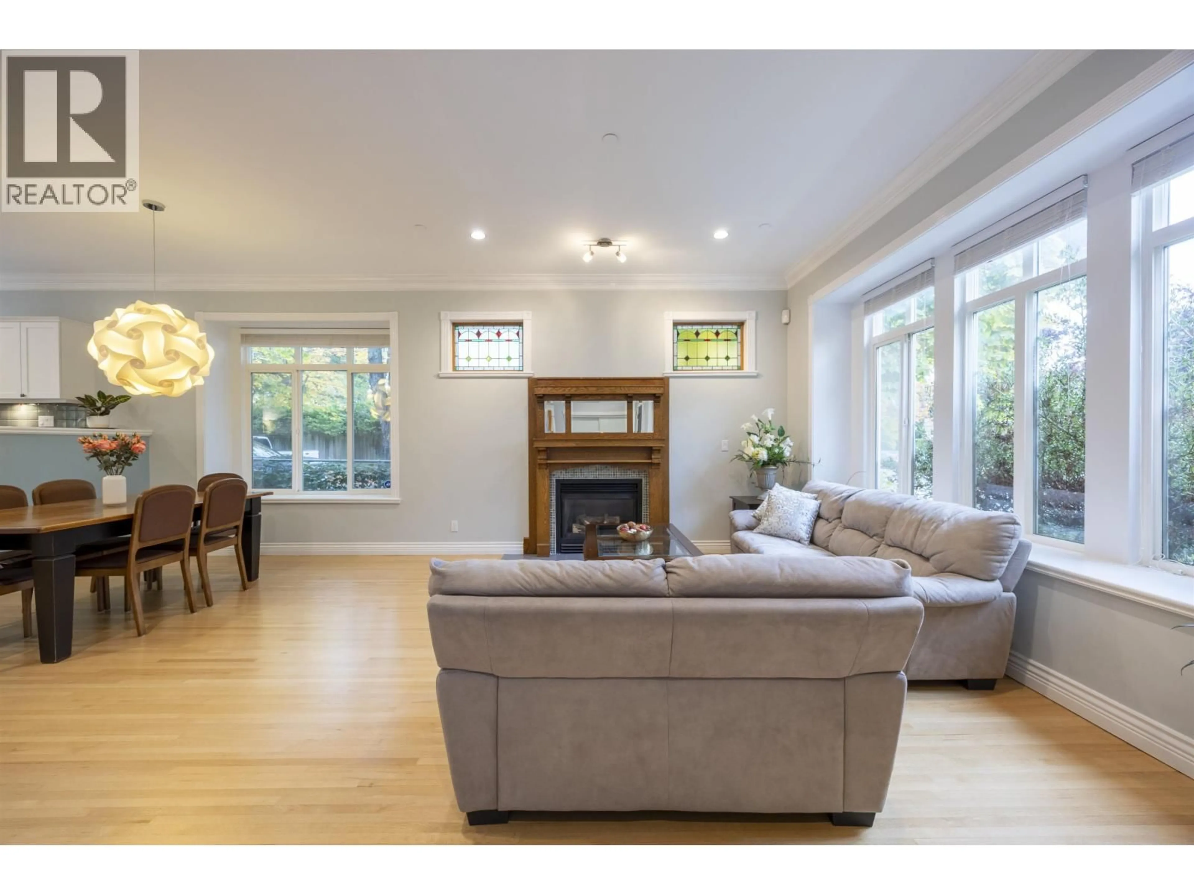 Living room with furniture, wood/laminate floor for 4203 14TH AVENUE, Vancouver British Columbia V6R2X7