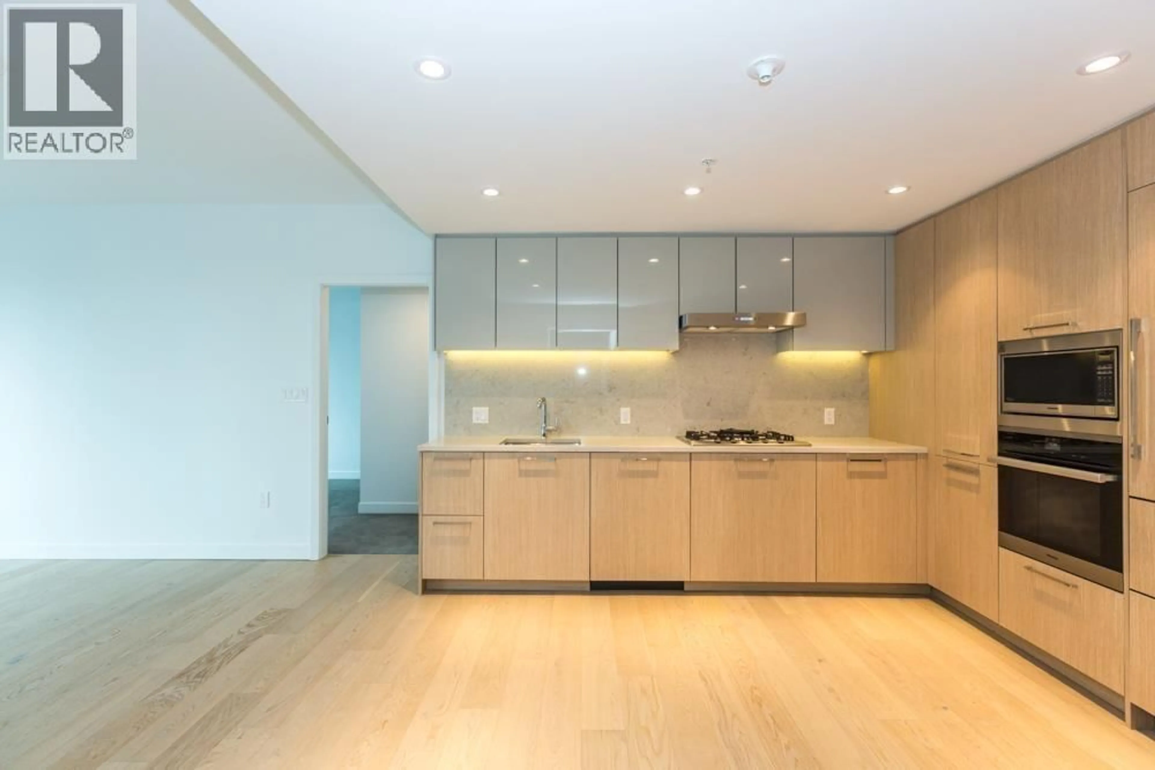 Open concept kitchen, unknown for 605 - 8160 MCMYN WAY, Richmond British Columbia V6X0V2