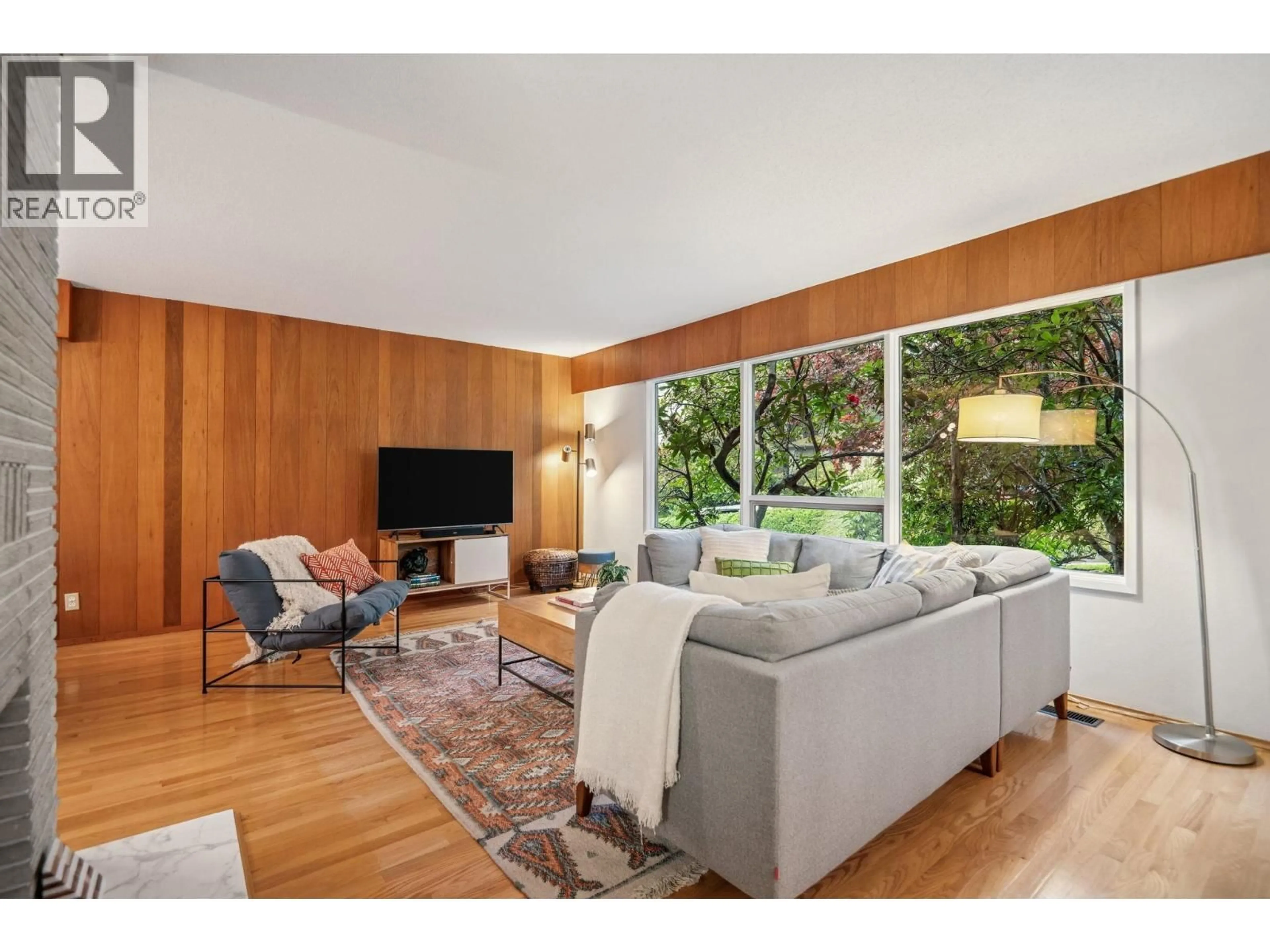 Living room with furniture, wood/laminate floor for 2174 HOSKINS ROAD, North Vancouver British Columbia V7J3A3