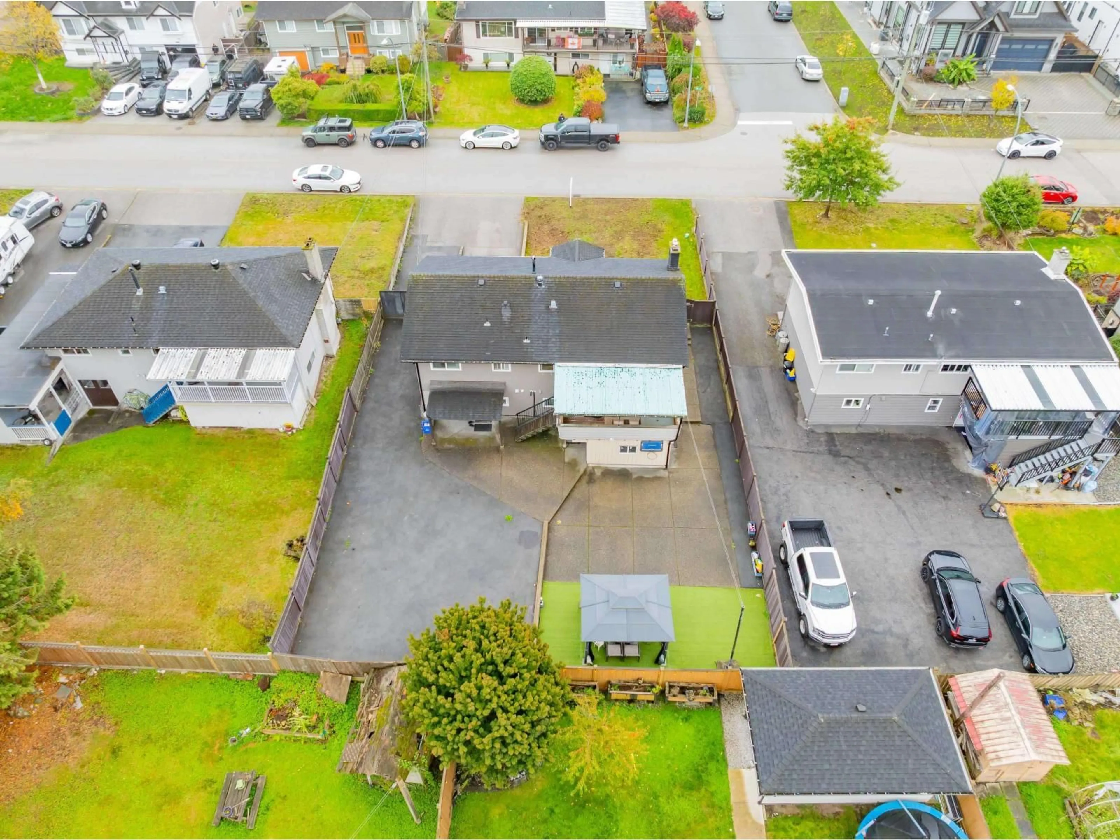 A pic from outside/outdoor area/front of a property/back of a property/a pic from drone, street for 11713 94, Delta British Columbia V4C3R5