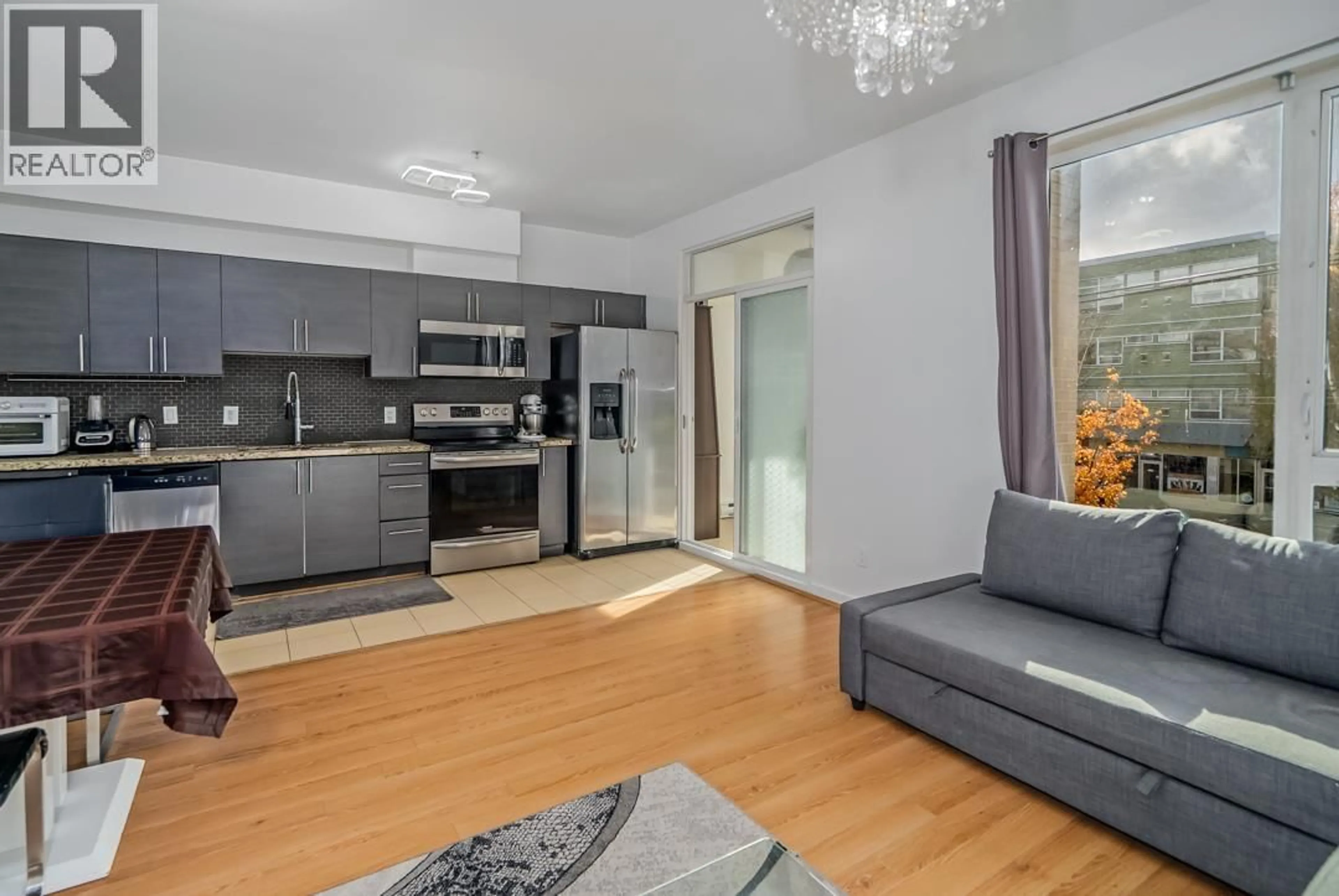 Living room with furniture, unknown for 212 - 2239 KINGSWAY, Vancouver British Columbia V5N0E5