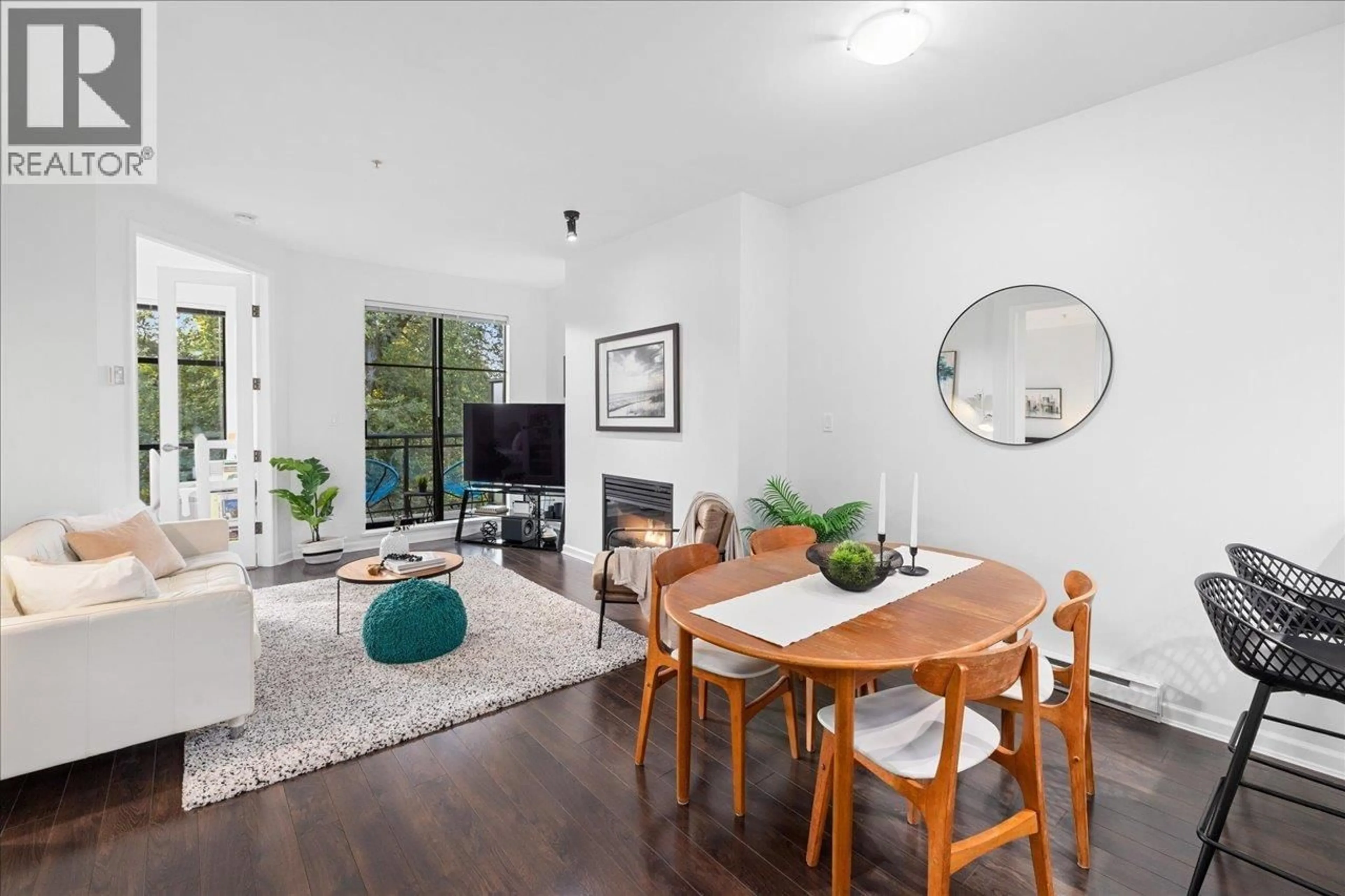 Living room with furniture, wood/laminate floor for 412 - 2065 12TH AVENUE, Vancouver British Columbia V6J5L9