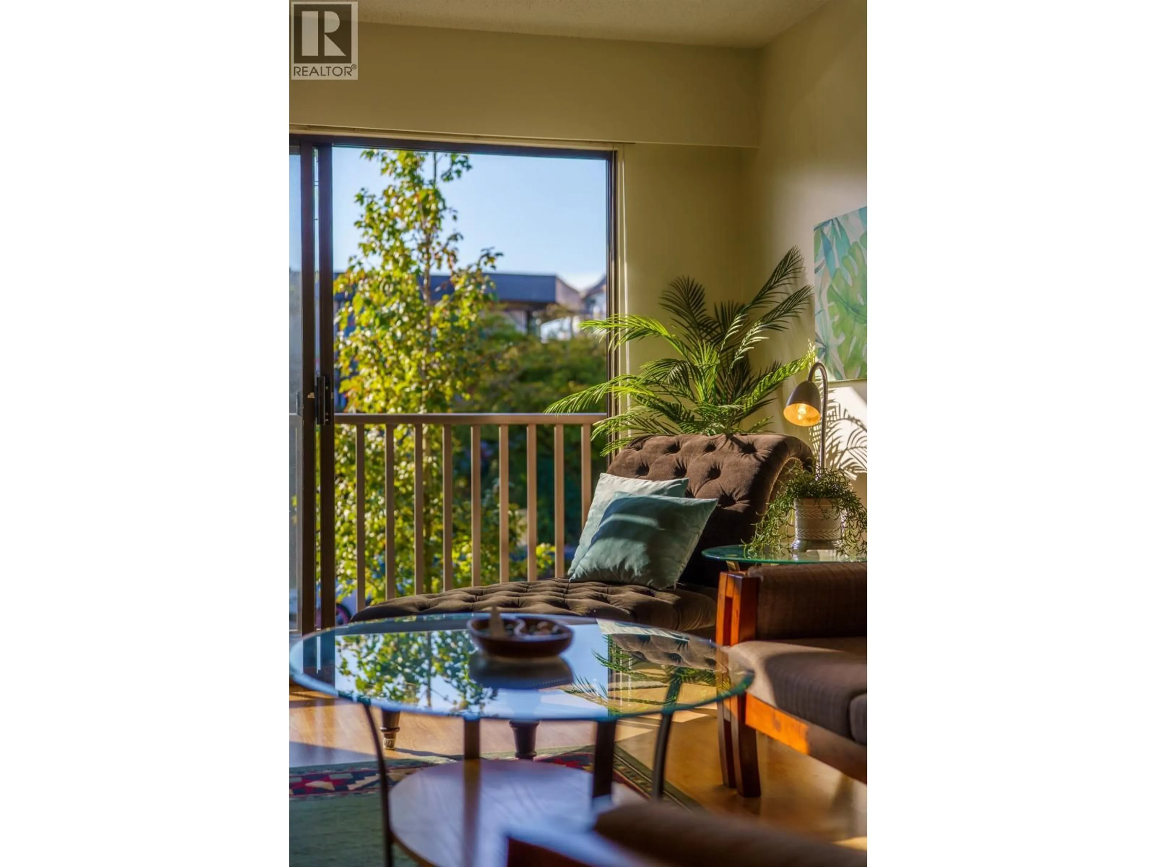 Living room with furniture, wood/laminate floor for 208 - 2255 5TH AVENUE, Vancouver British Columbia V6K4K1