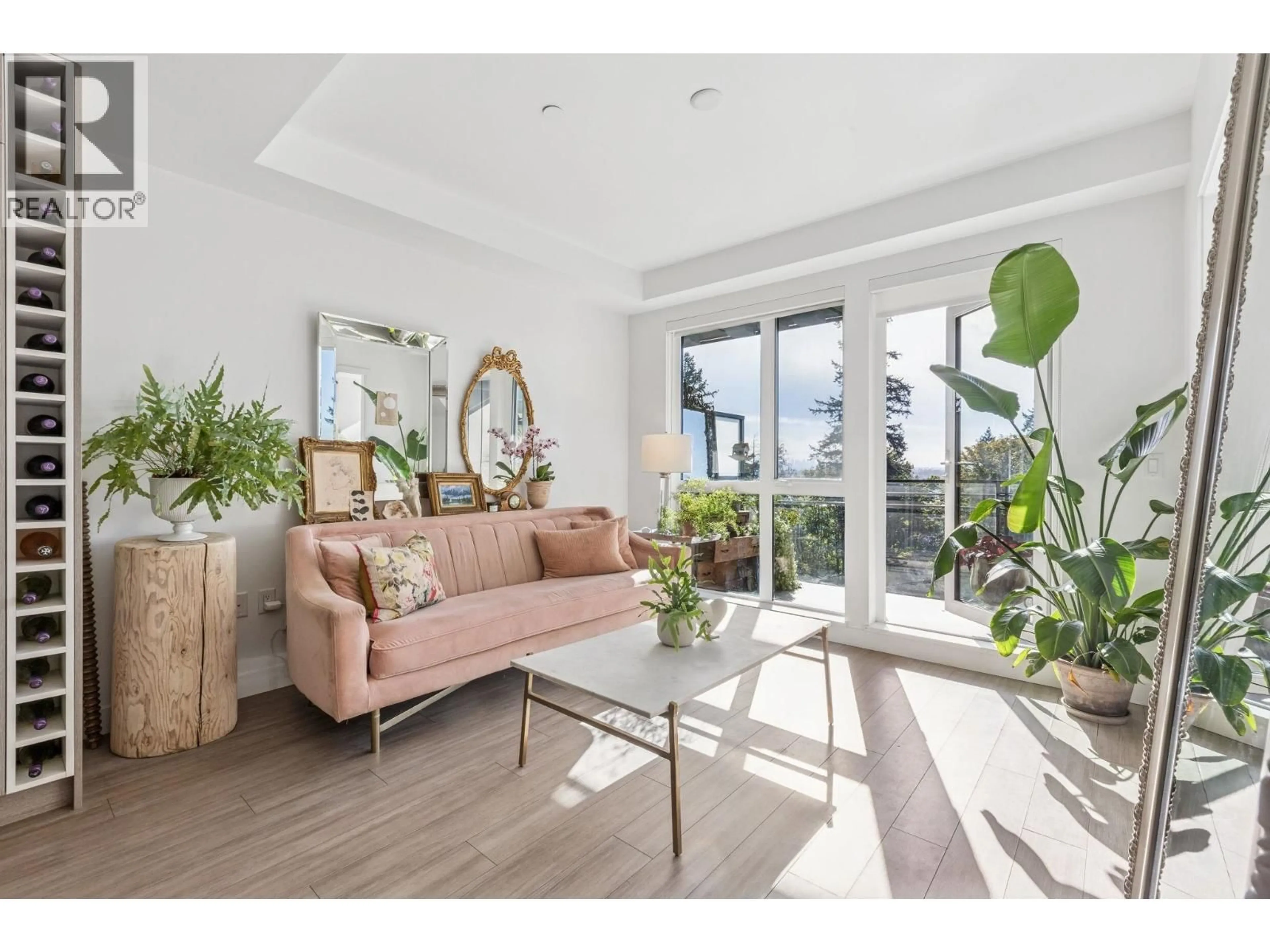 Living room with furniture, wood/laminate floor for 307 - 707 3RD STREET, North Vancouver British Columbia V7L1G8