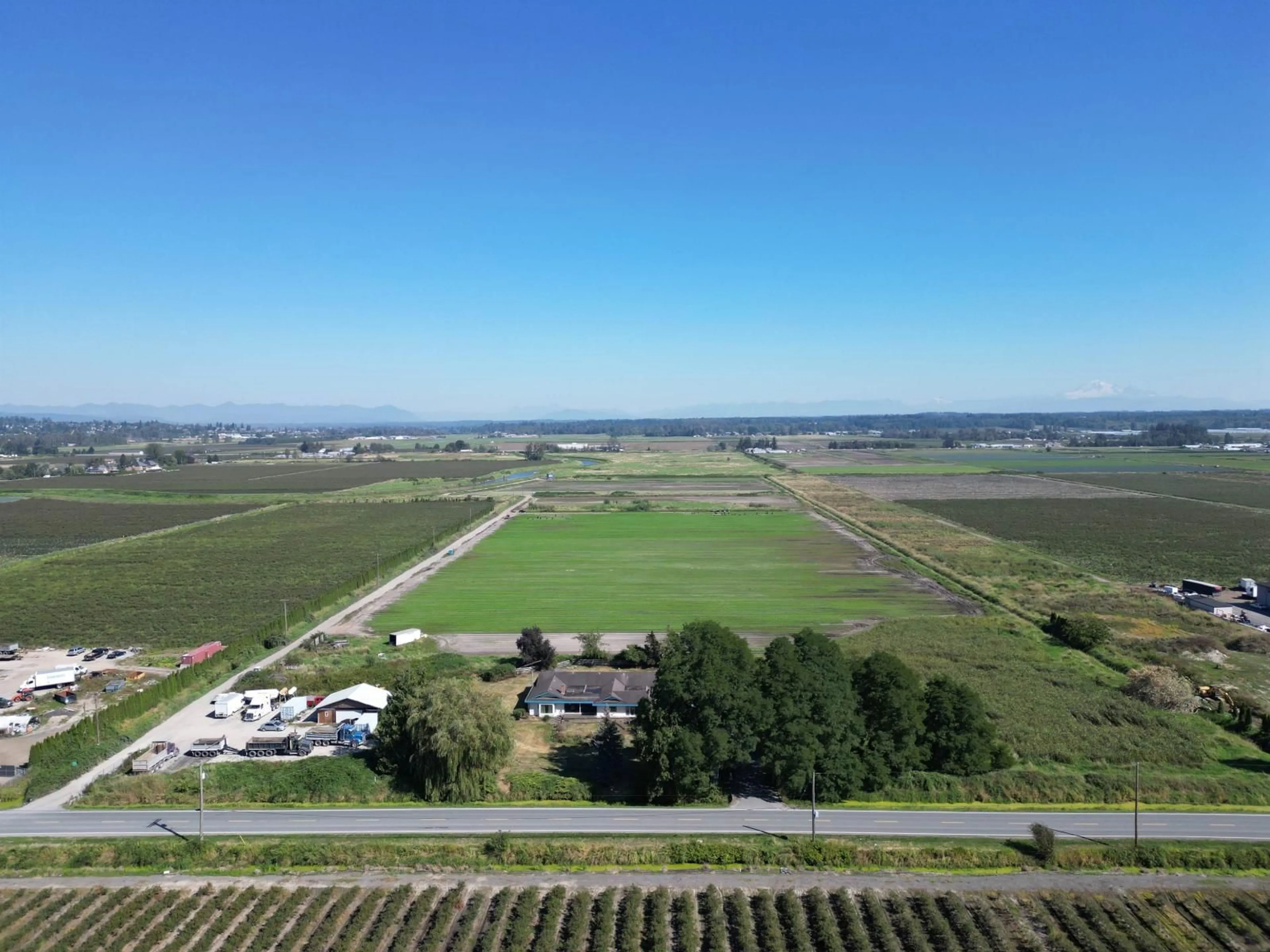 A pic from outside/outdoor area/front of a property/back of a property/a pic from drone, mountain view for 4444 168, Surrey British Columbia V3Z1E3
