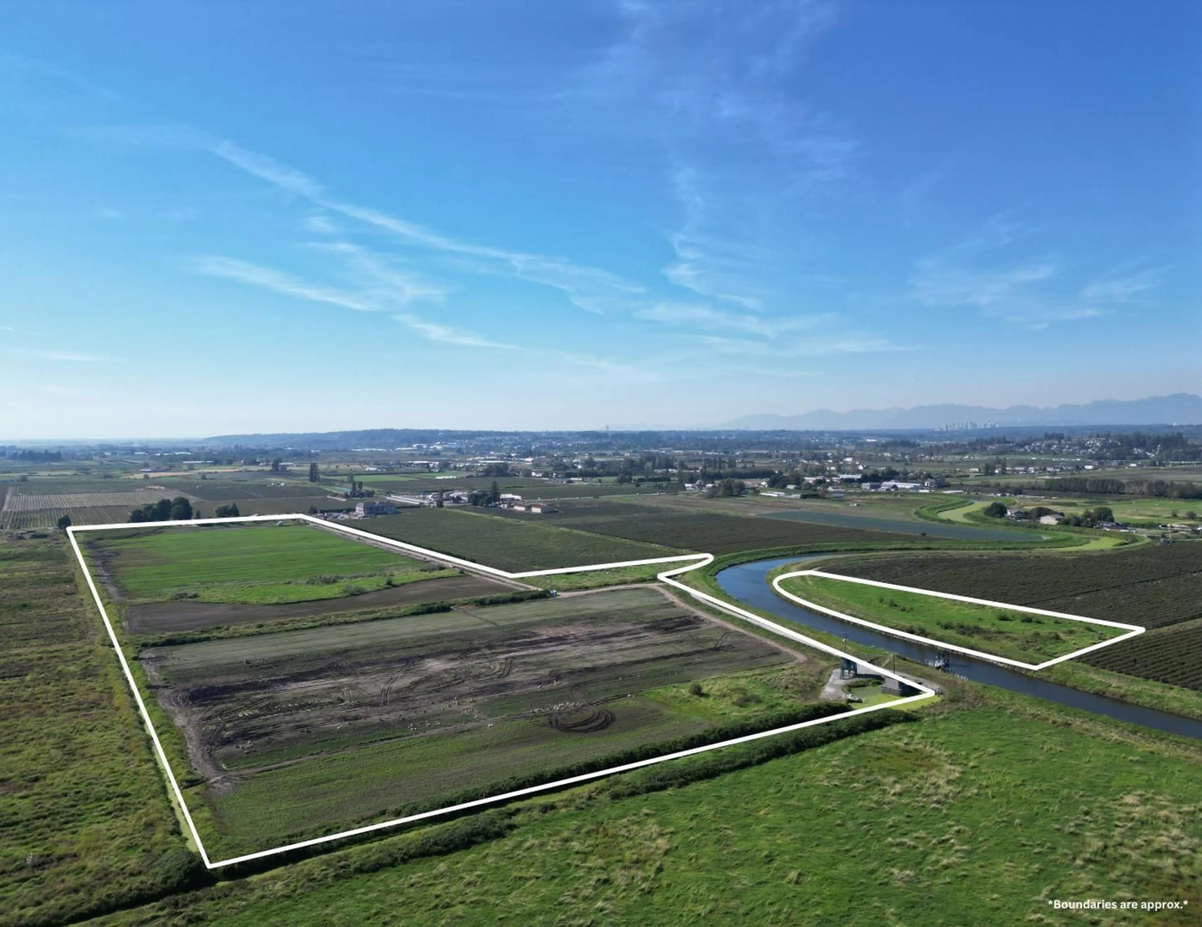 A pic from outside/outdoor area/front of a property/back of a property/a pic from drone, water/lake/river/ocean view for 4444 168, Surrey British Columbia V3Z1E3
