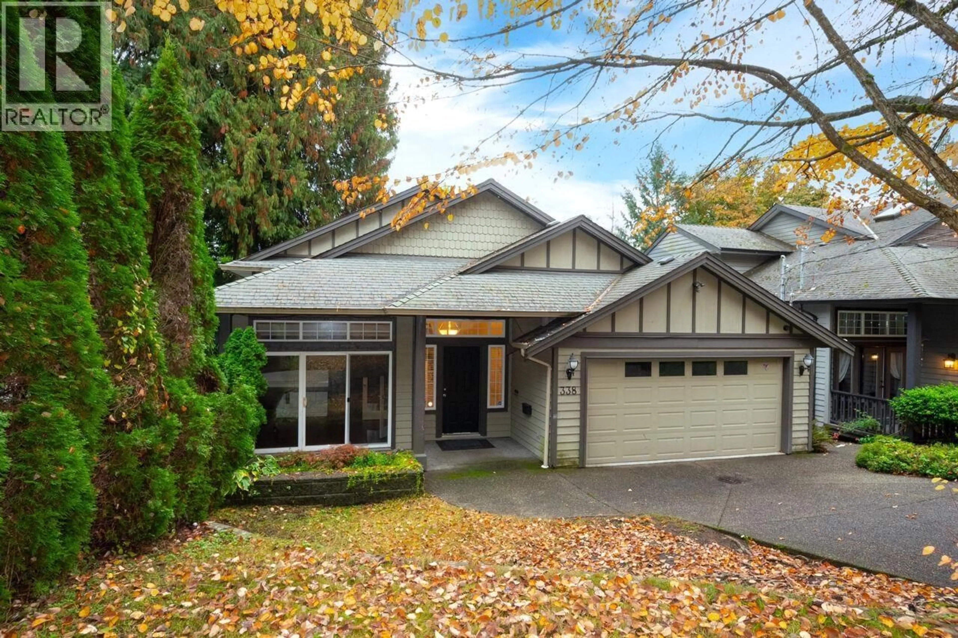 Home with vinyl exterior material, street for 338 DOLLARTON HIGHWAY, North Vancouver British Columbia V7G1N1