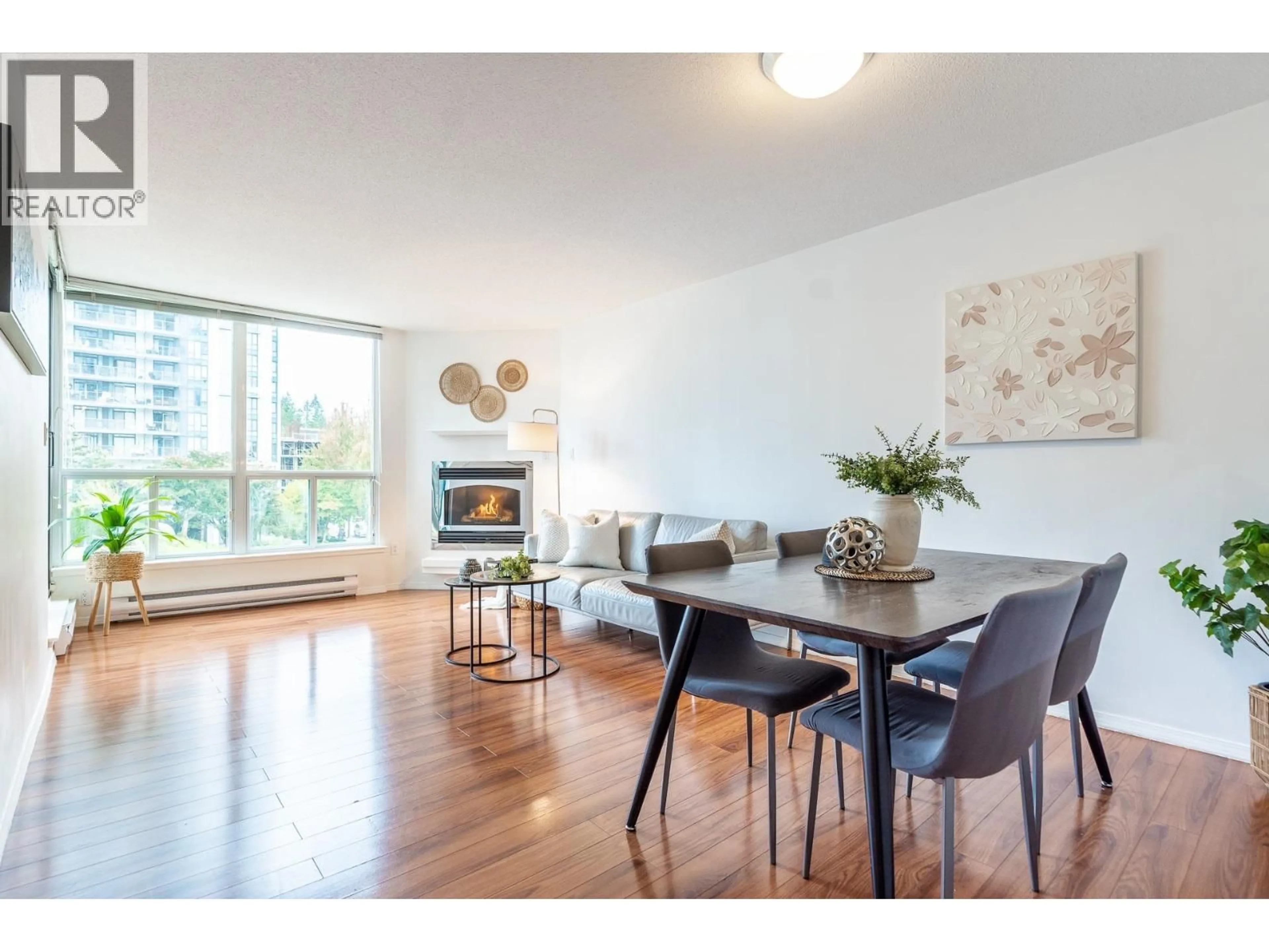 Living room with furniture, wood/laminate floor for 405 - 1148 HEFFLEY CRESCENT, Coquitlam British Columbia V3B8A6